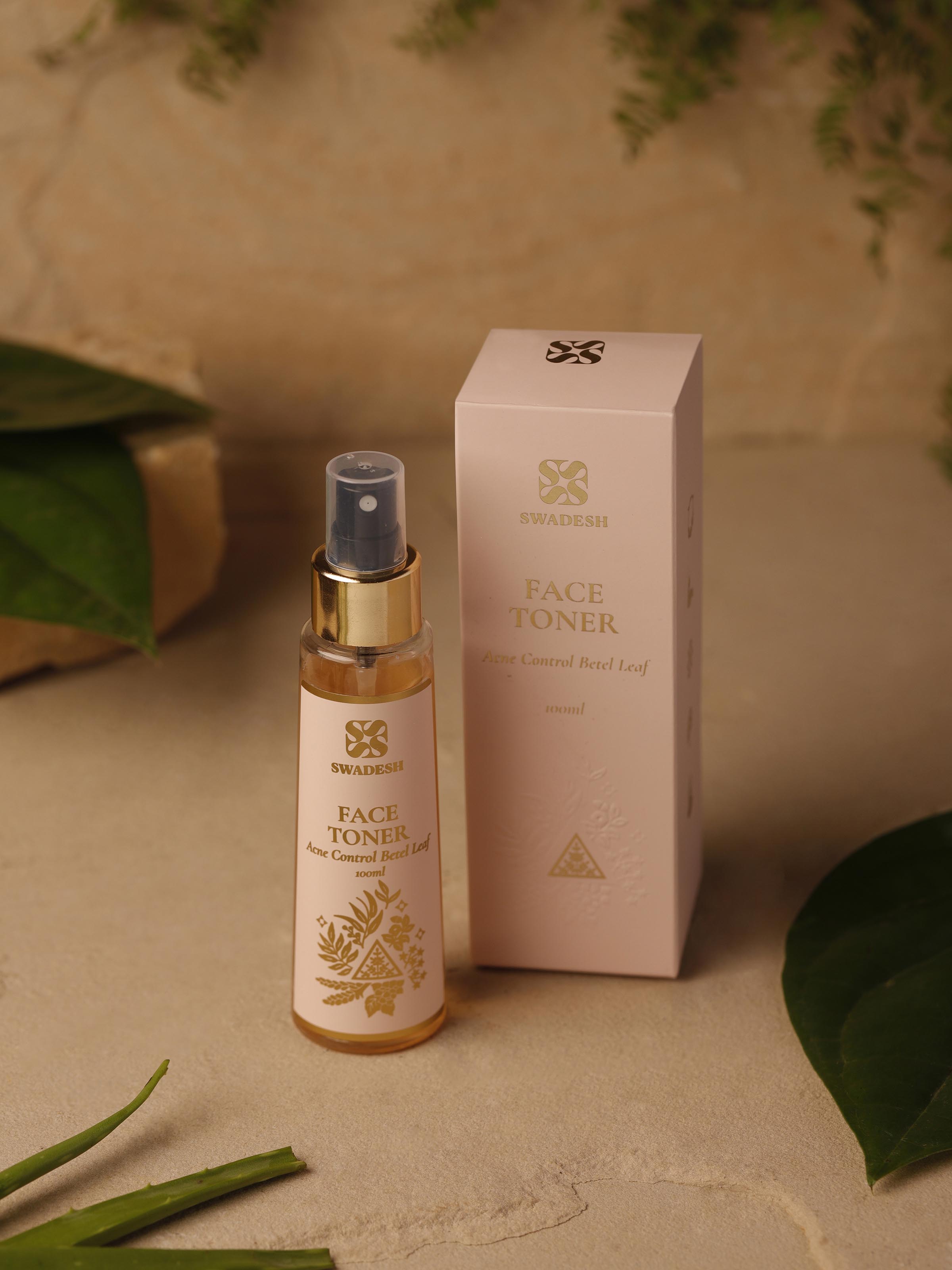 Side view of Face Toner Acne Control Betel Leaf highlighting the spray nozzle and vibrant label design