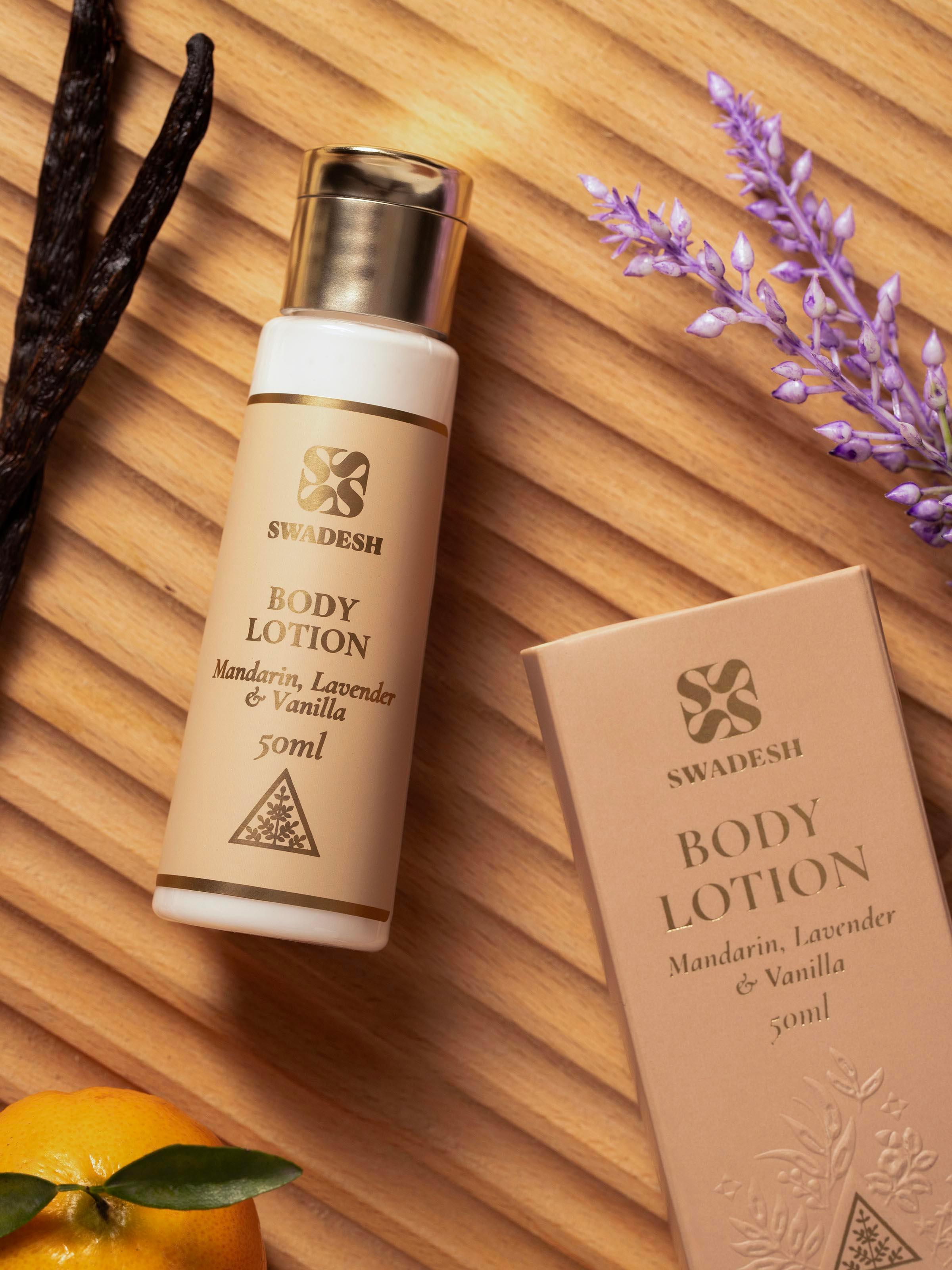 Side view of Body Lotion Mandarin, Lavender & Vanilla highlighting the detailed product label and texture of the lotion.