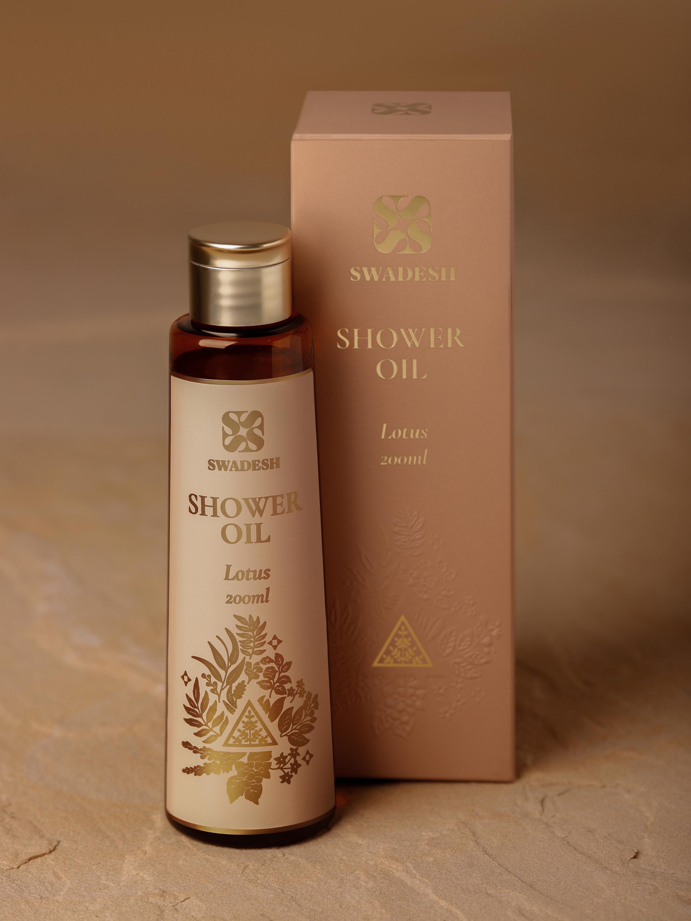 Side view of Shower Oil Lotus displaying the application method and benefits for soft, radiant skin