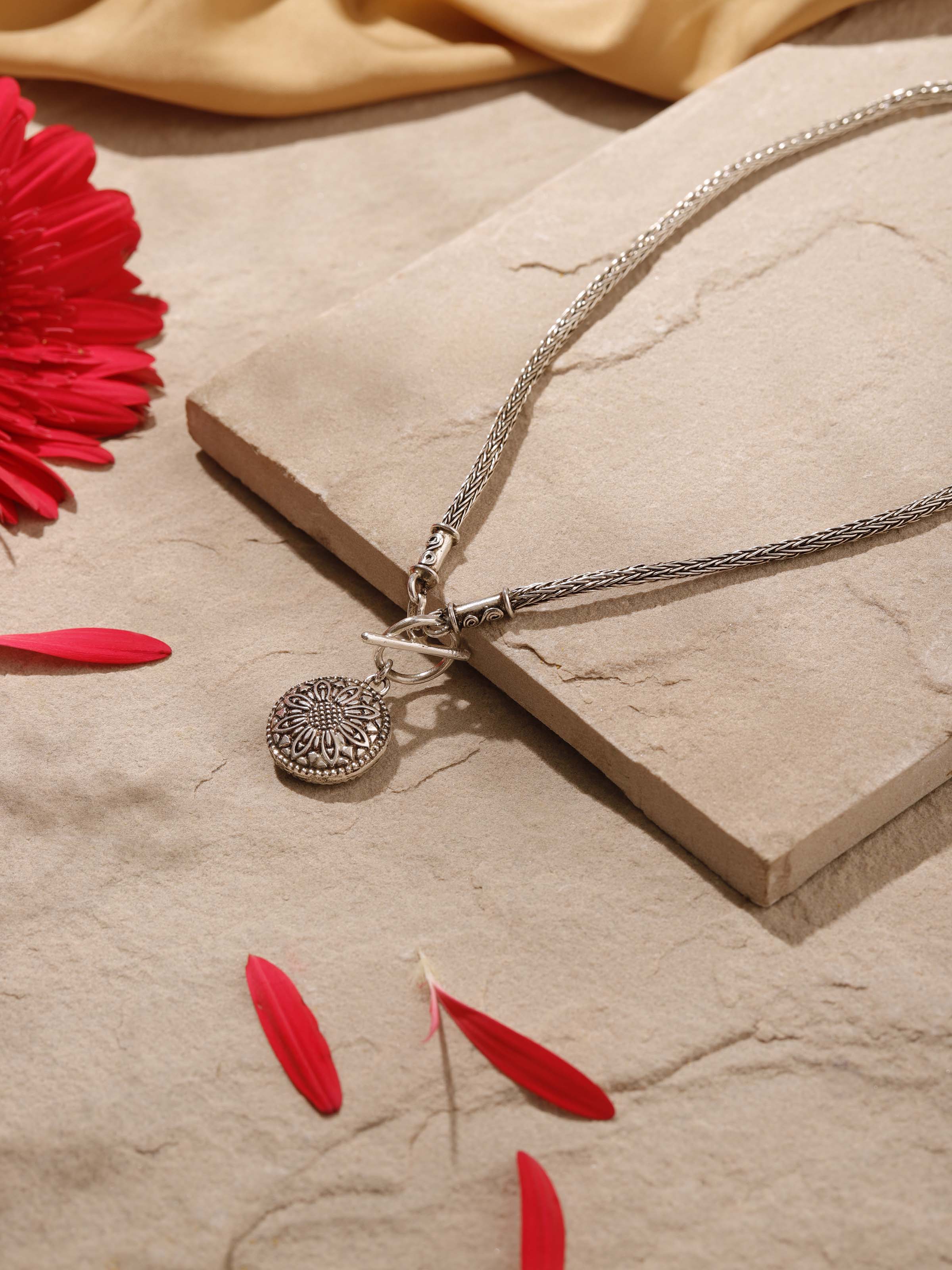 Side view of Silver Collar Necklace showcasing the sleek, contoured design.