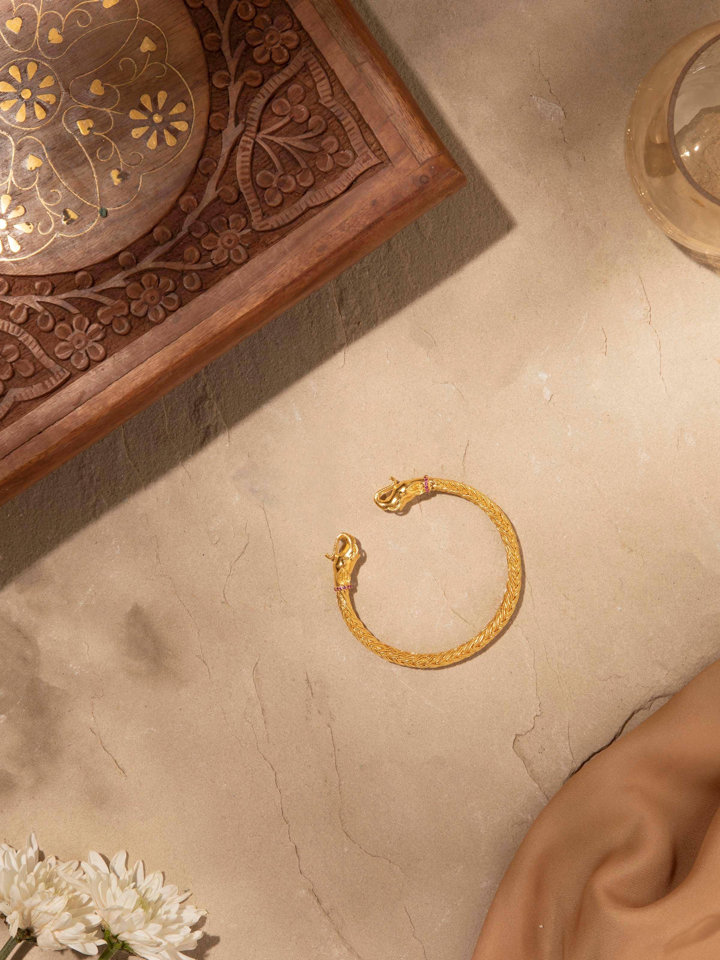 Overhead view of Silver Bangle emphasizing its sleek design and smooth finish