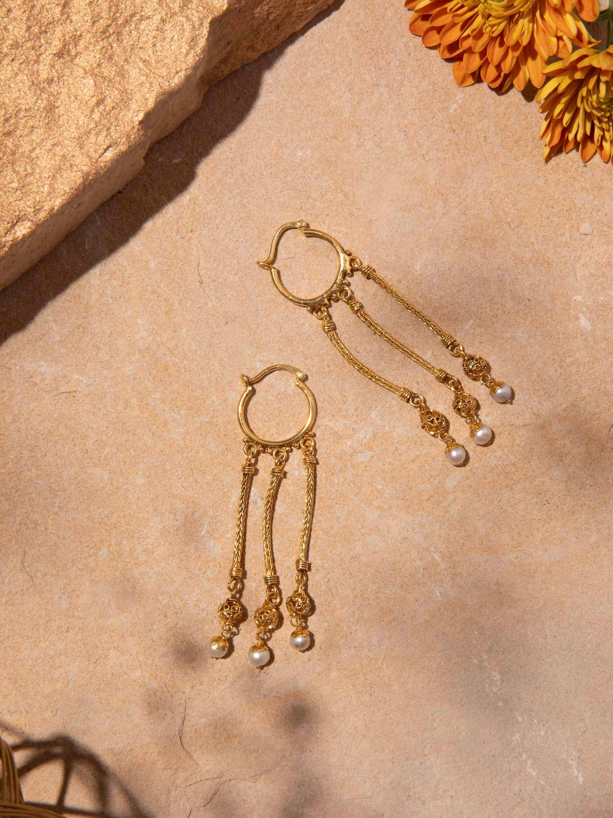 Close-up of Silver Drop Earrings, highlighting detailed craftsmanship