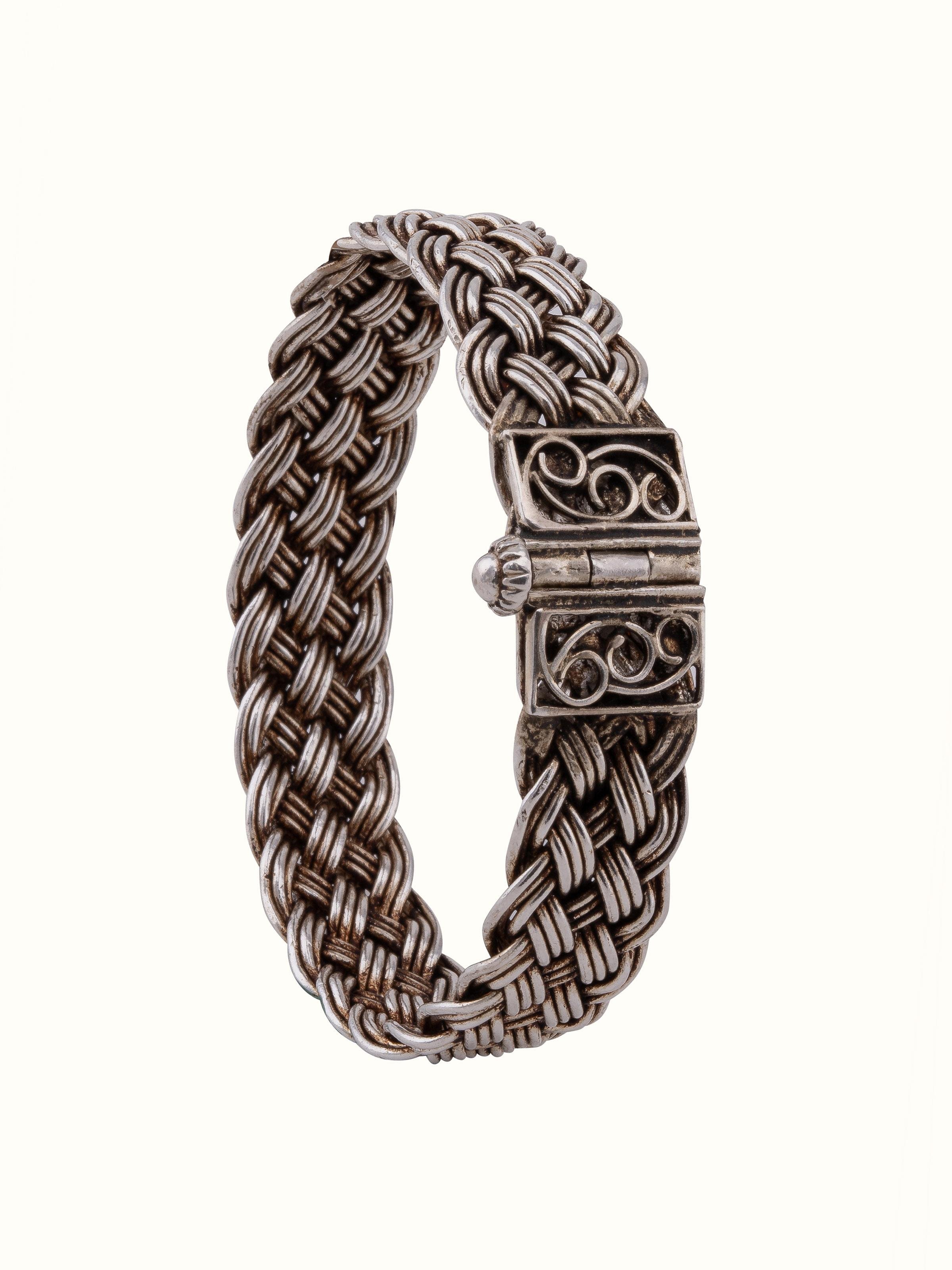 Front view of Silver bangle highlighting its smooth, polished finish and classic design.