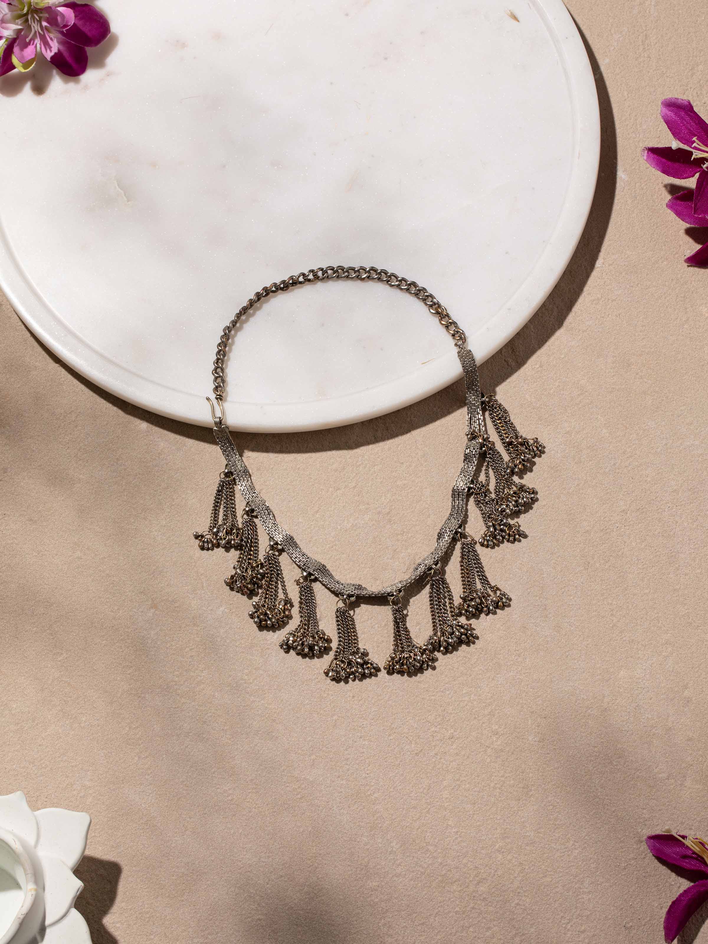 Side view of Tribal Silver Collar Necklace displaying the unique collar shape.