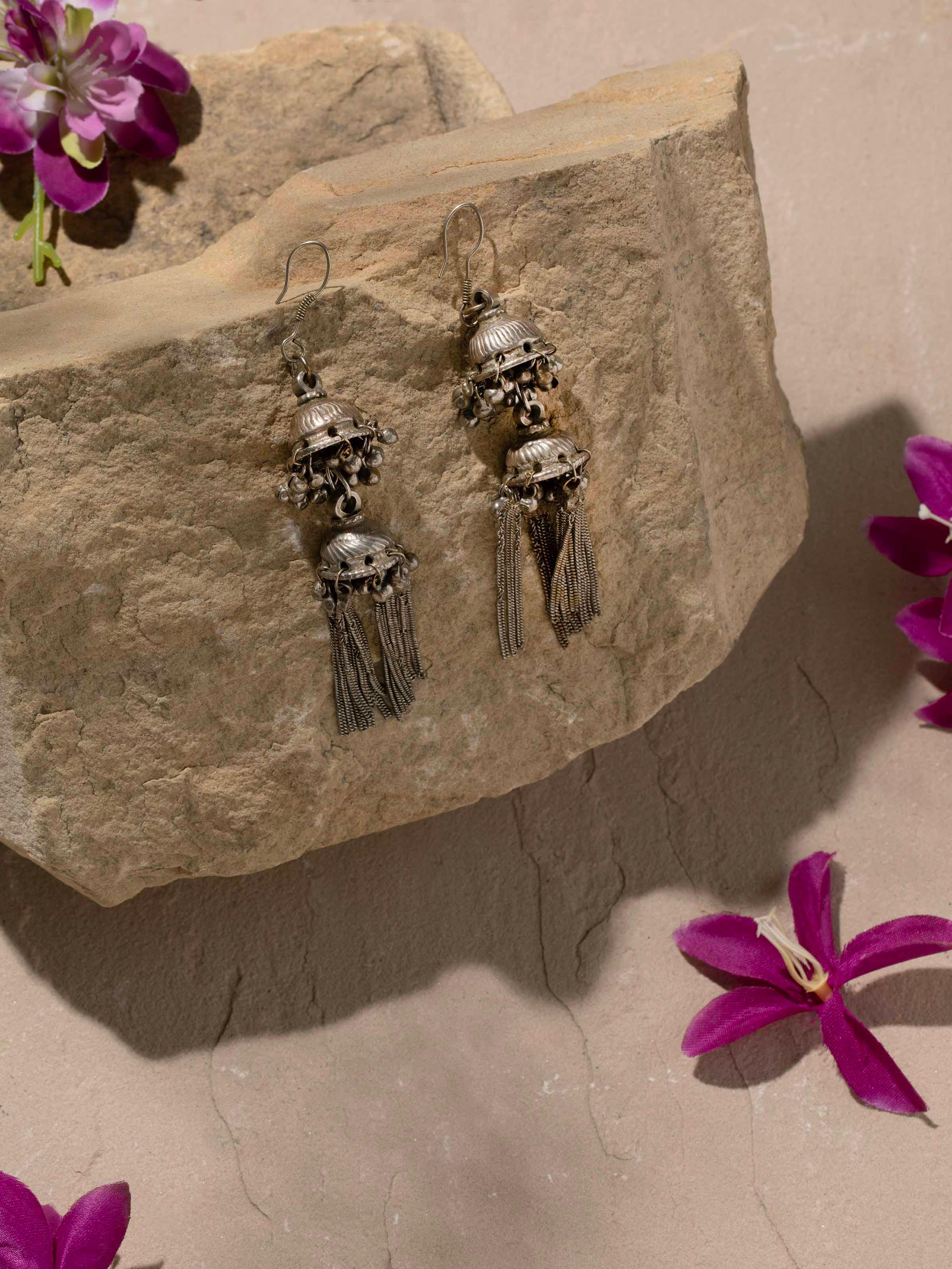 Side view of Tribal Silver Jhumkas highlighting detailed jhumka design and craftsmanship.