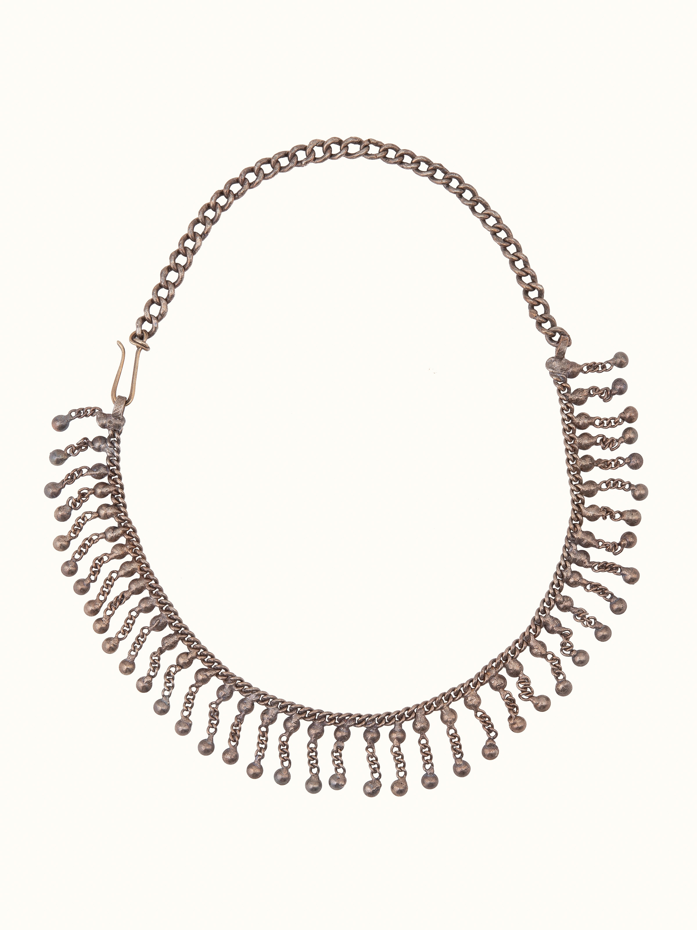 Front view of Tribal Silver Collar Necklace by Swadesh showcasing bold tribal design and polished silver finish