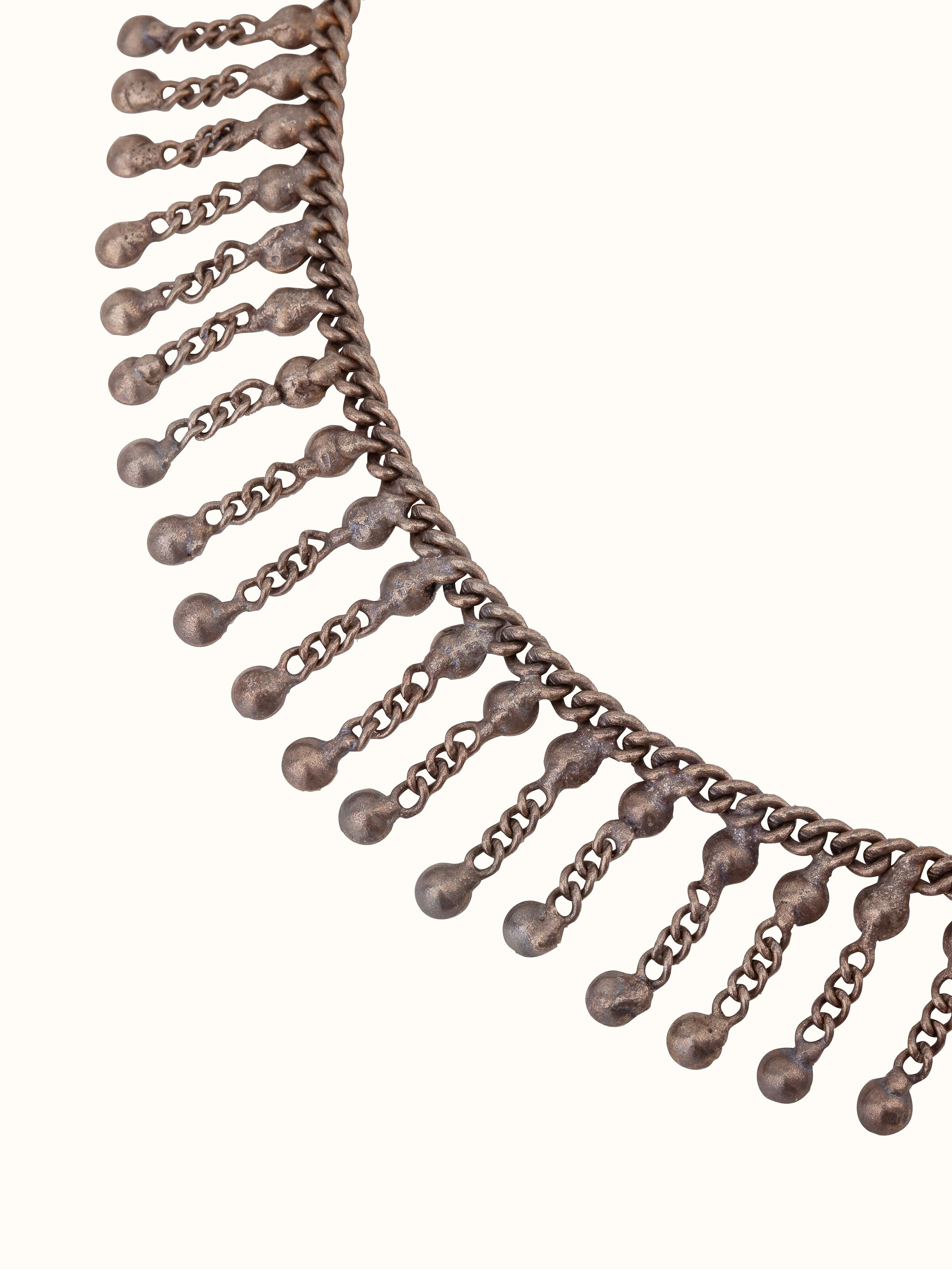 Overhead view of Tribal Silver Collar Necklace by Swadesh emphasizing the clean lines and elegant silver curves