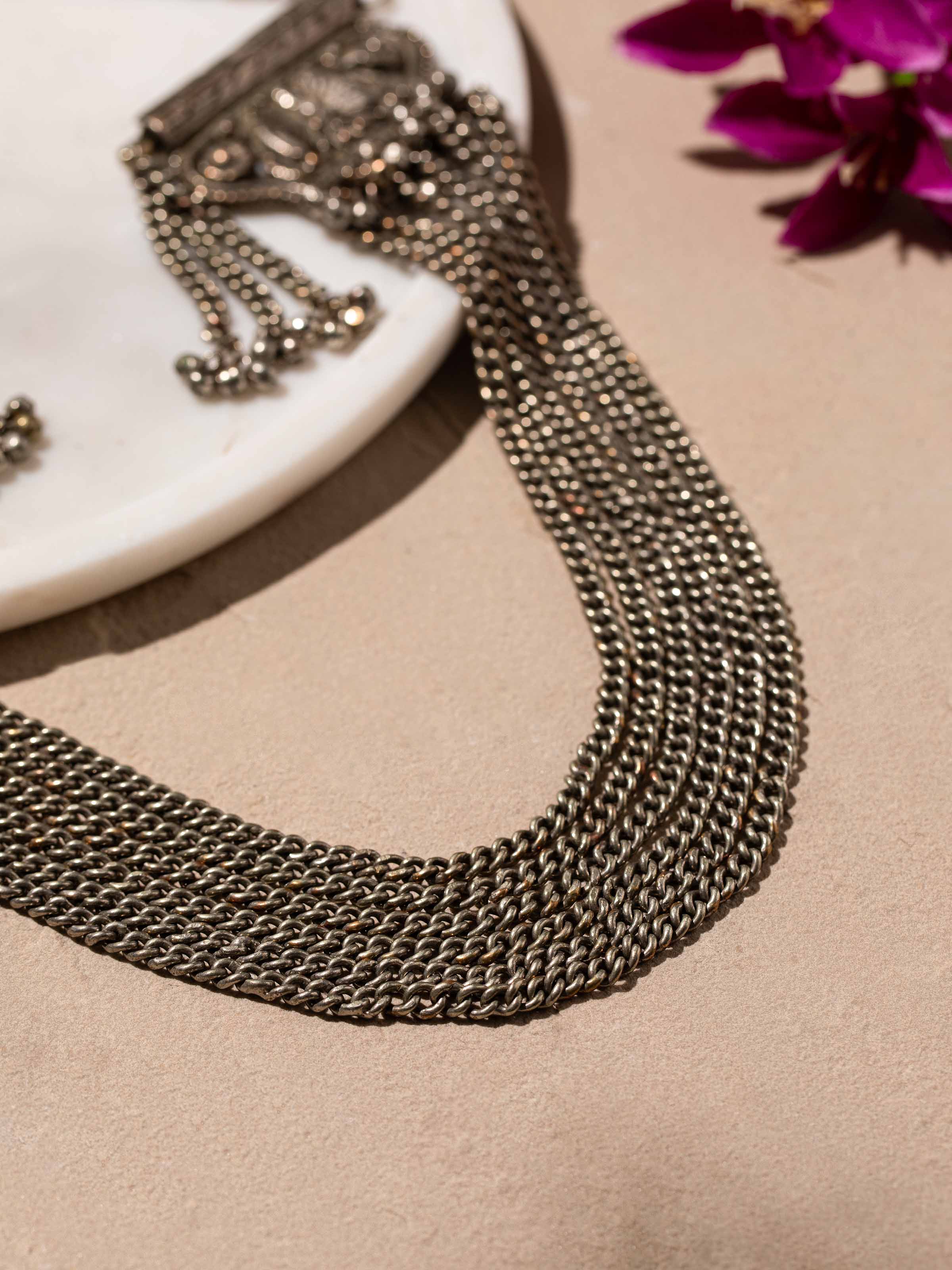 Detailed view of Tribal Silver Long Necklace focusing on the craftsmanship and design elements.