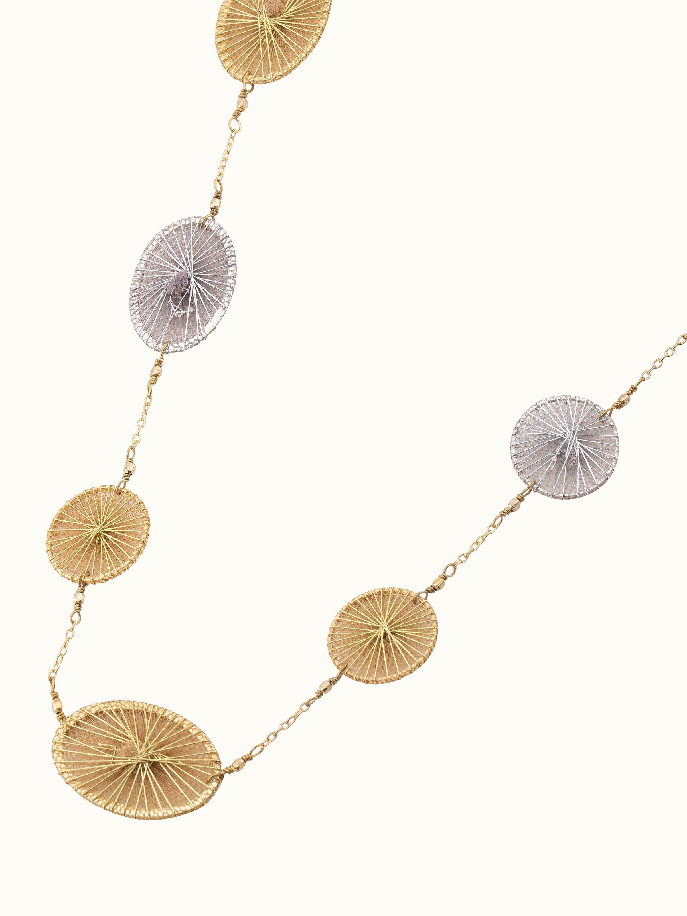 Overhead view of String Craft Long Necklace showcasing the full length and elaborate string design