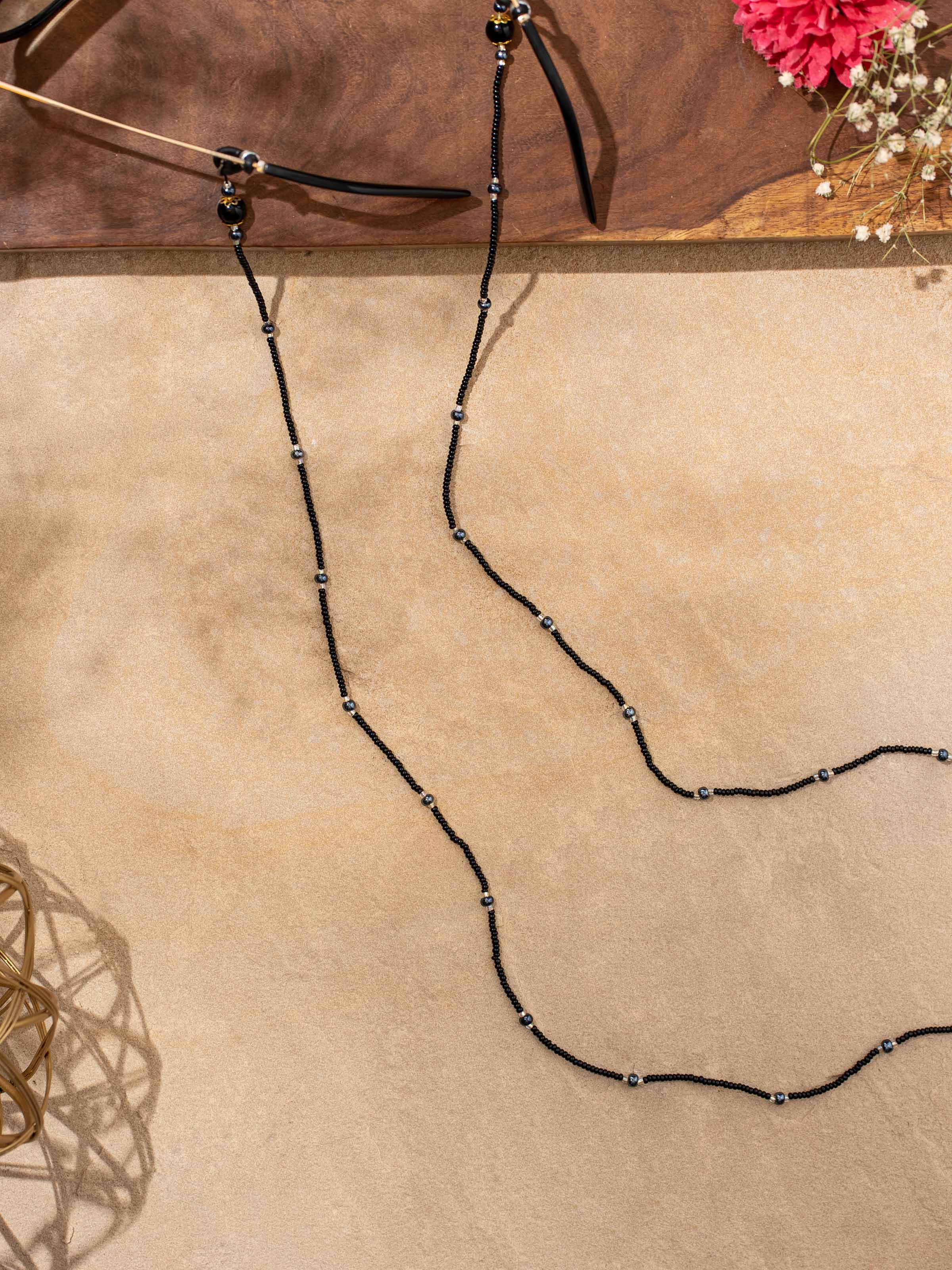 Close-up view of Glass Bead Lanyard showing the detailed glass bead design and vibrant hues.