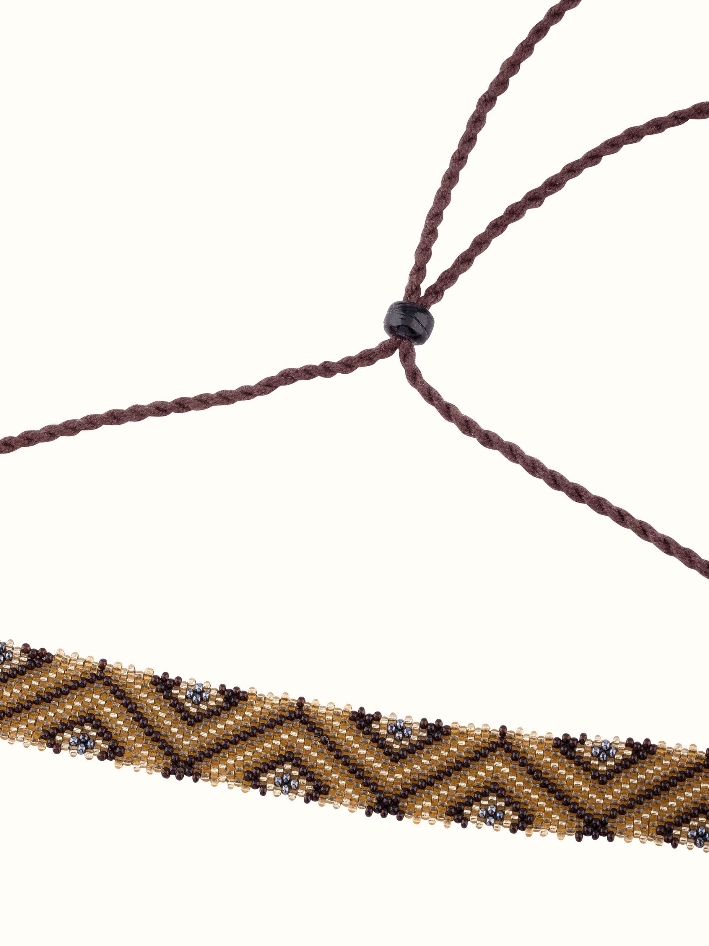 Angled view of Glass Bead Choker emphasizing the detailed beadwork and design.