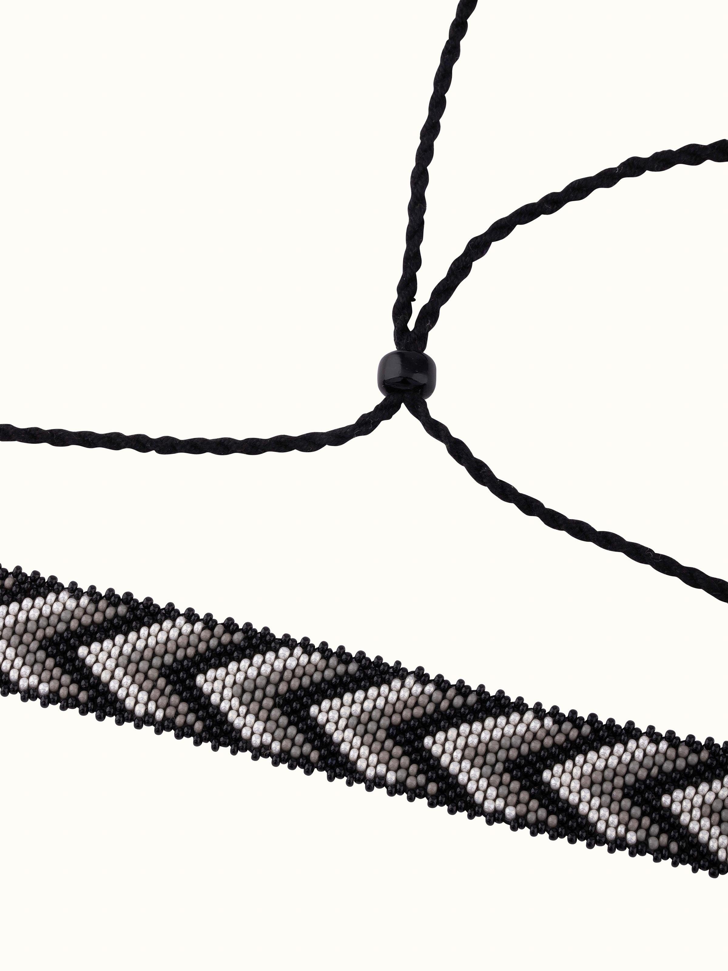 Angled view of Glass bead choker showcasing colorful beads and detailed design