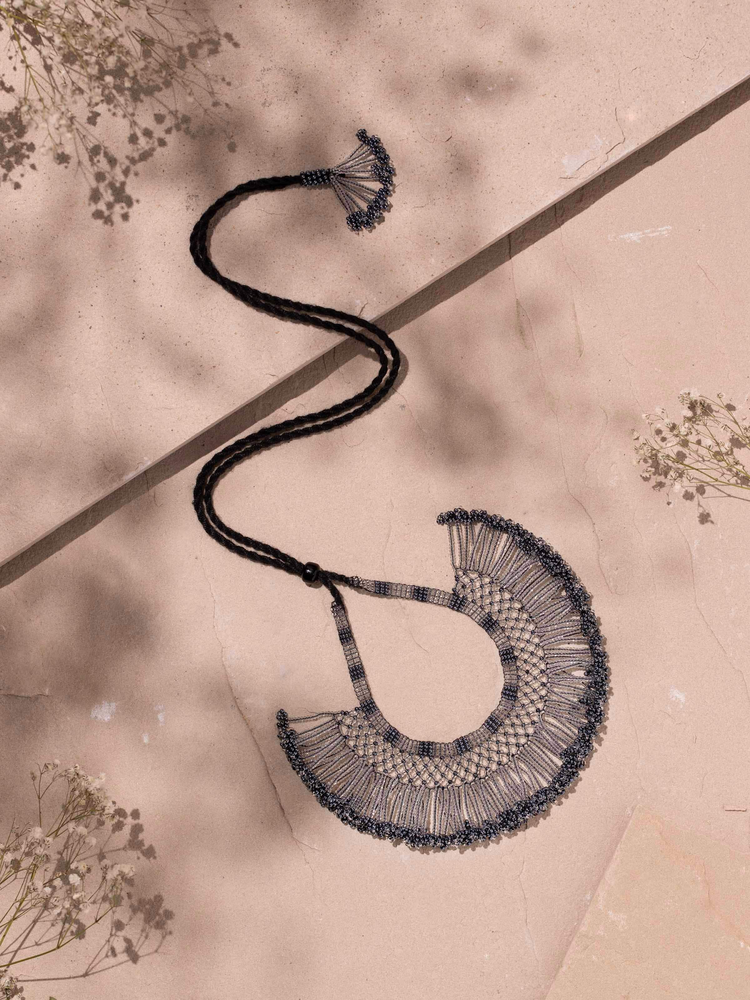 Side view of glass bead choker highlighting vibrant colors and intricate bead arrangement