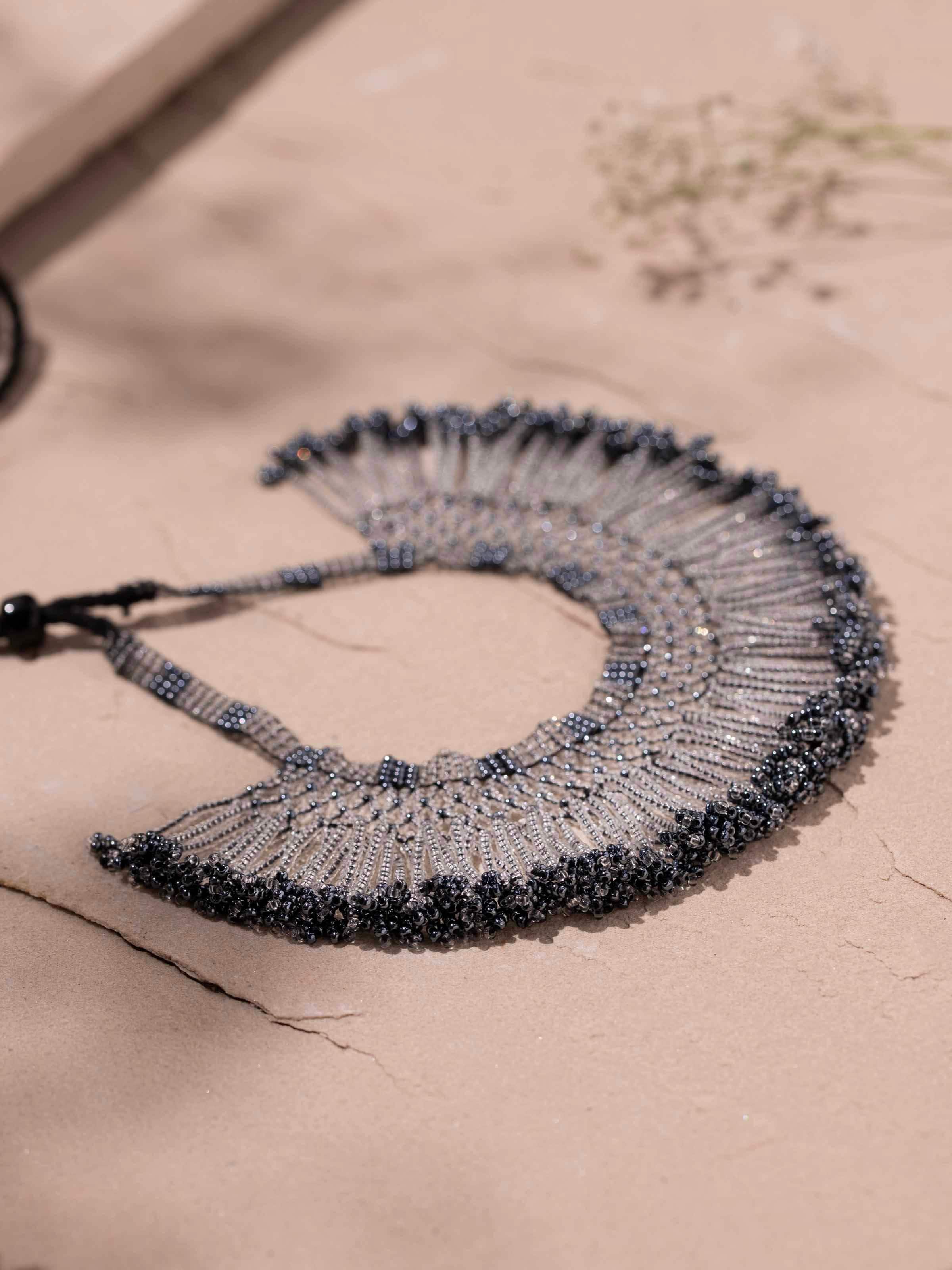 Detailed shot of glass bead choker focusing on vibrant colors and intricate bead design