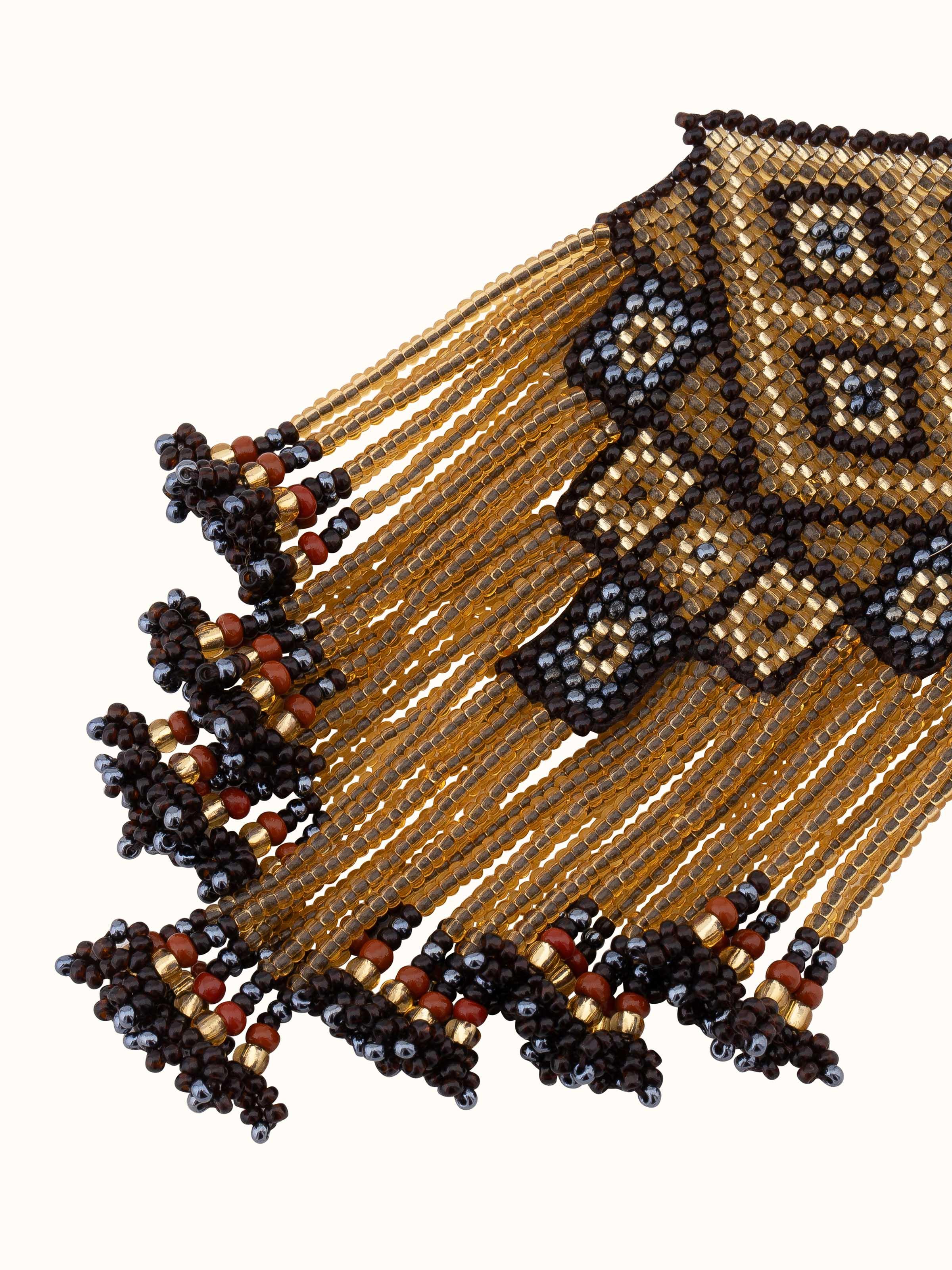 Detailed view of glass bead long necklace emphasizing bead quality and design