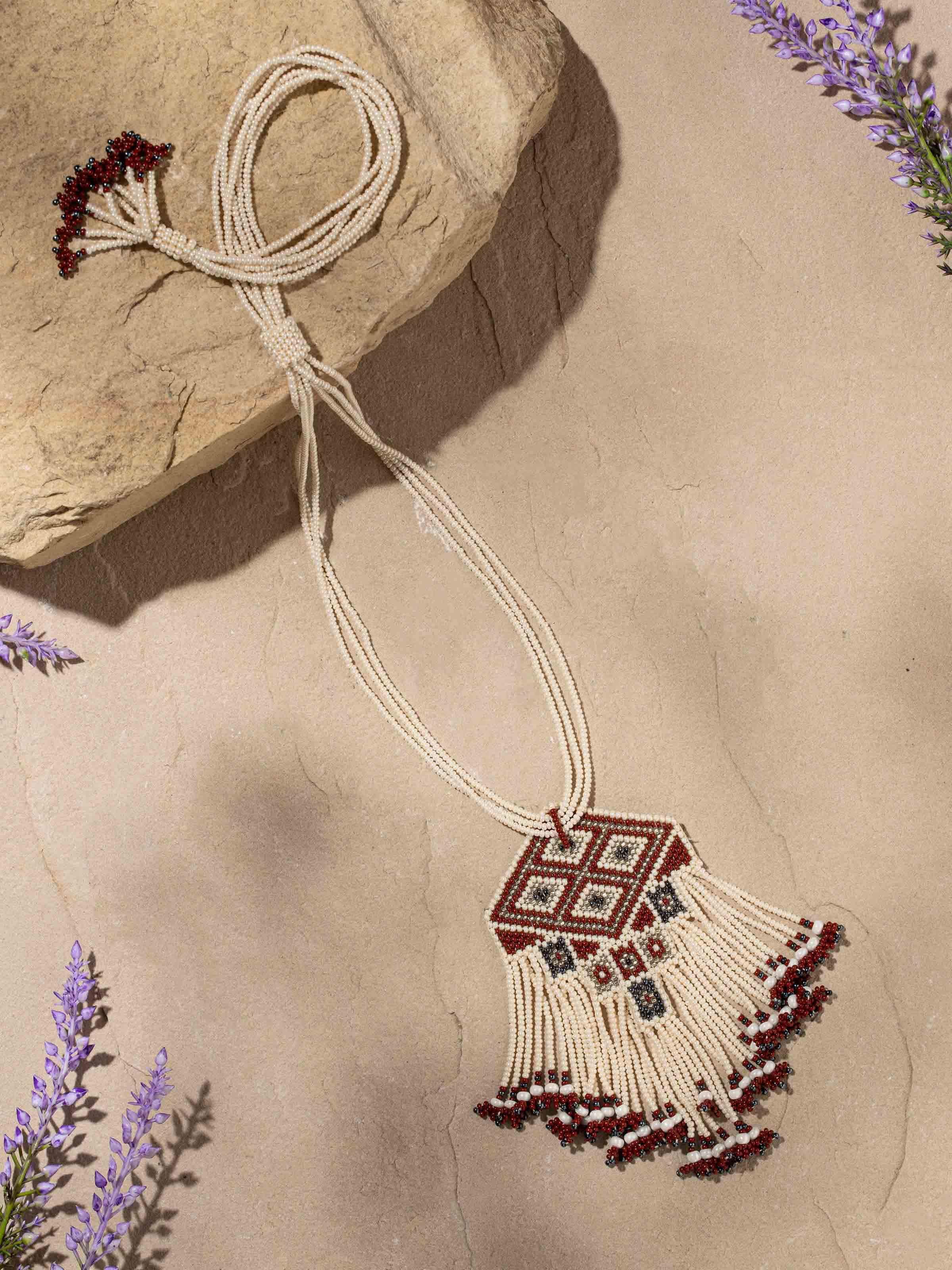 Side view of glass bead long necklace highlighting the colorful beads