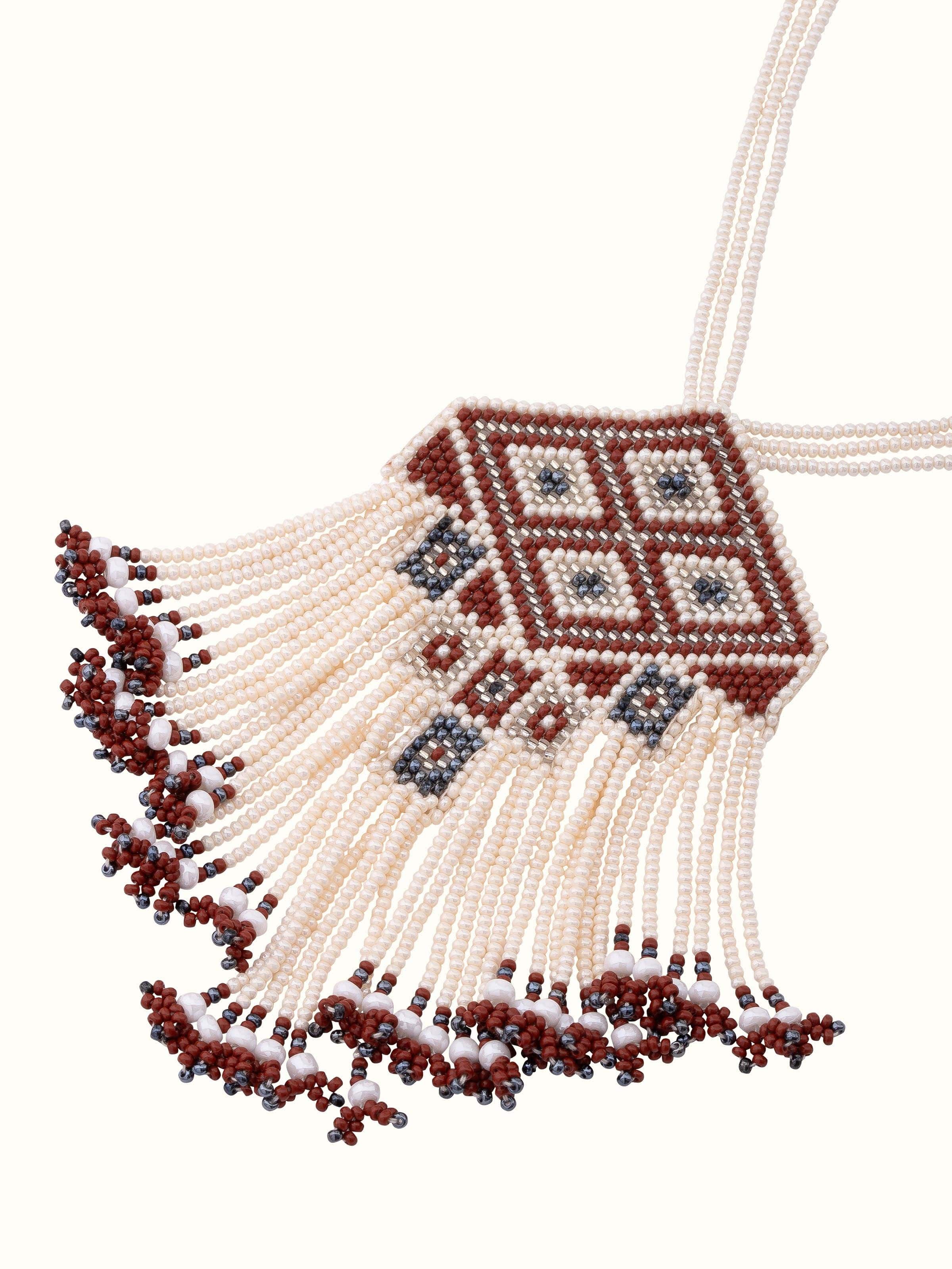 Angled view of glass bead long necklace with its elegant bead arrangement