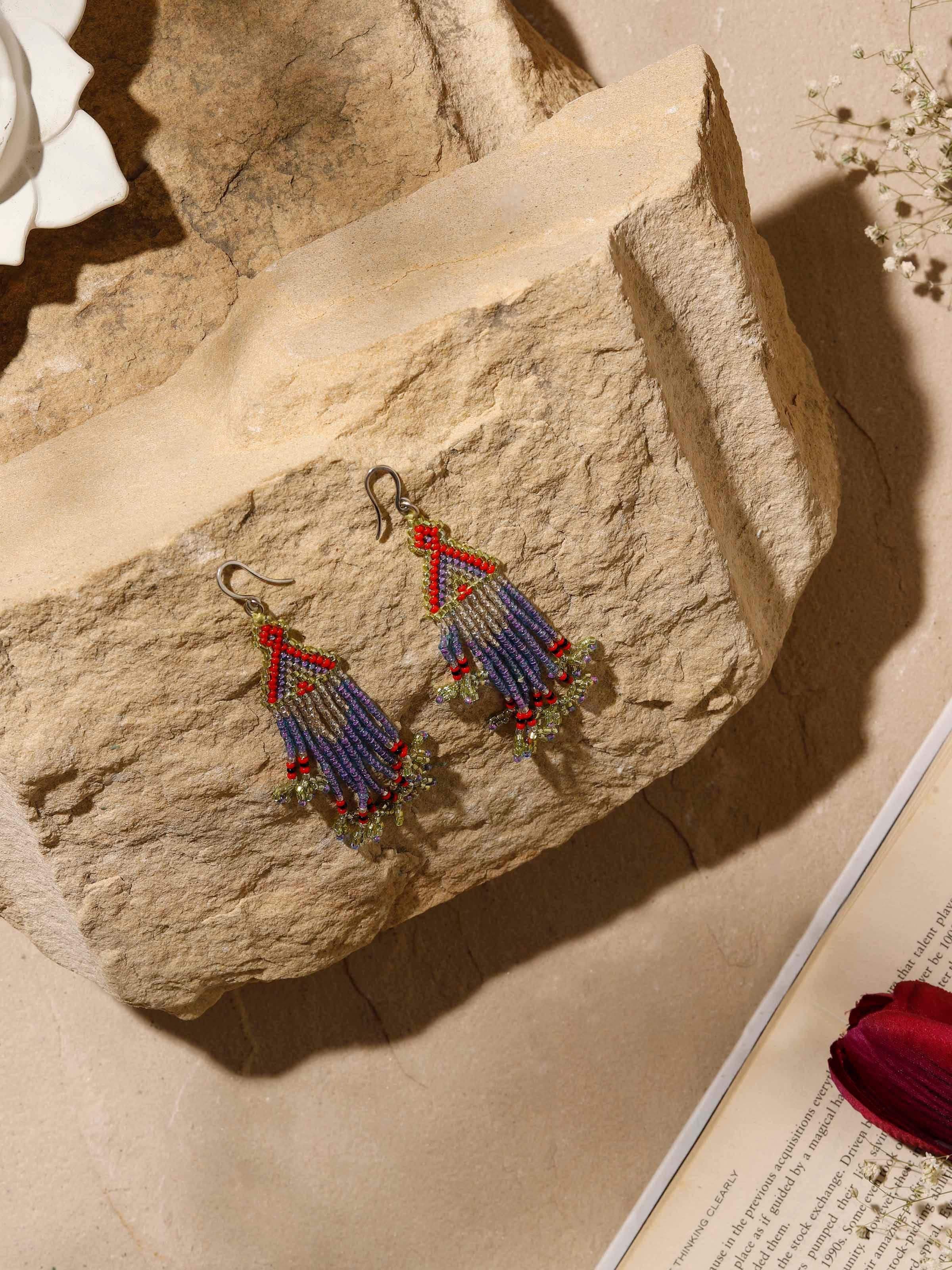 Side view of Glass bead drop earrings highlighting the detailed bead arrangement and design