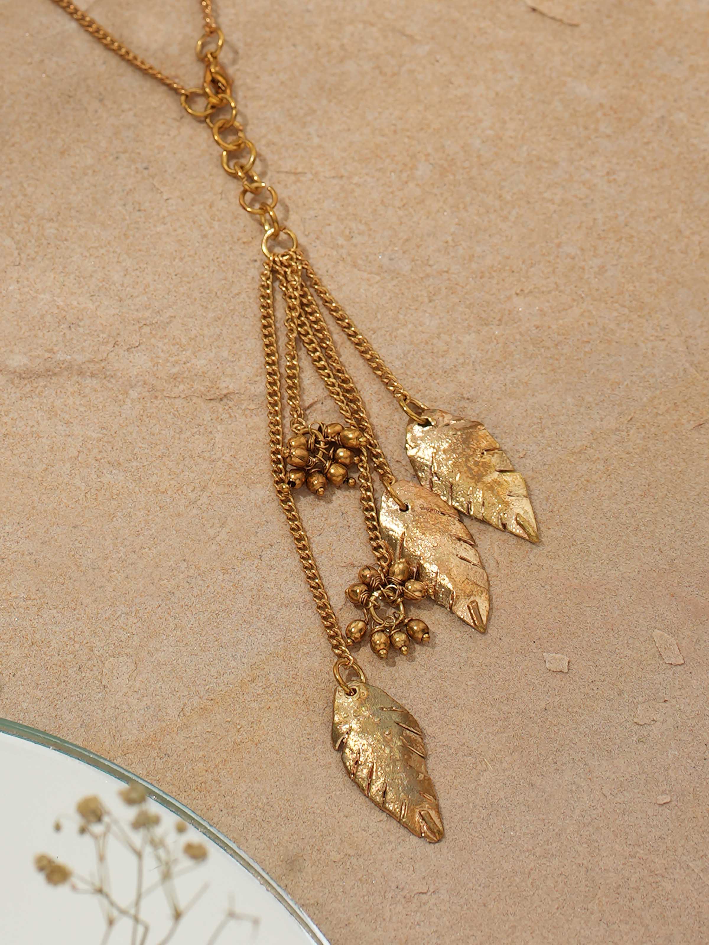 Detailed view of Dhokra Pendant & Chain showcasing the artistic Dhokra design and fine detailing.