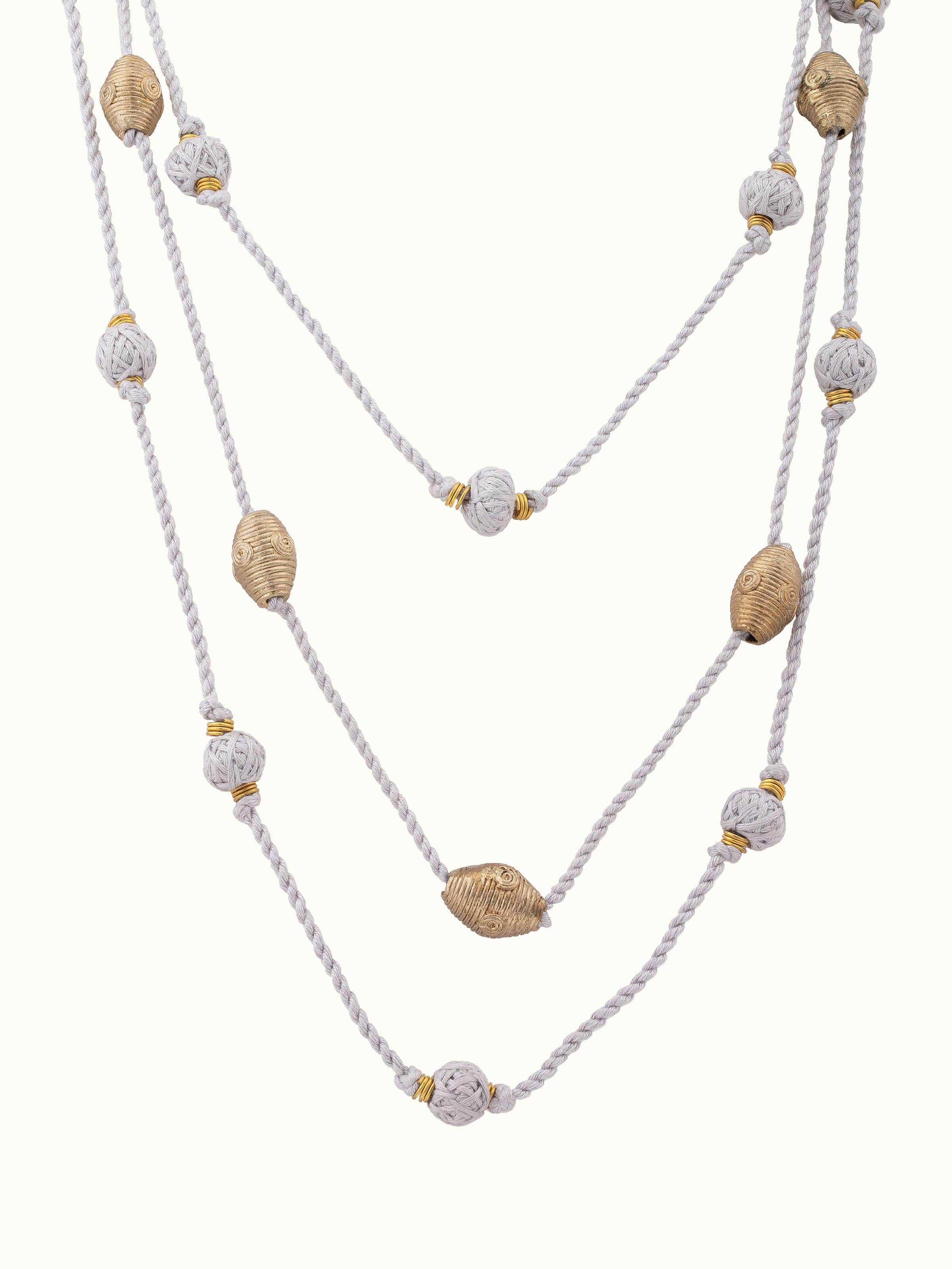 Front view of Dhokra long necklace showcasing traditional craftsmanship