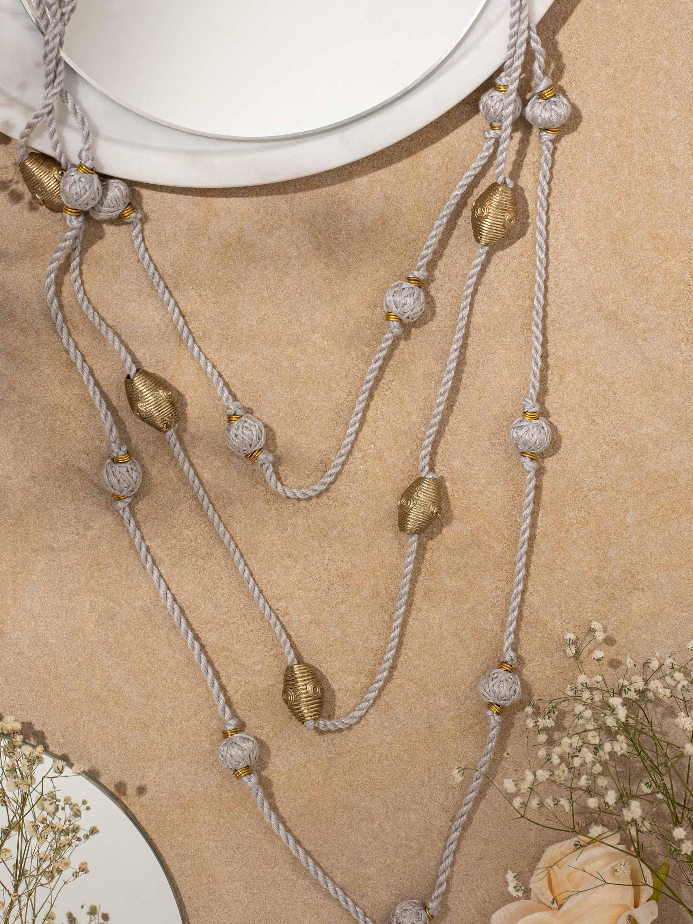 Detailed view of Dhokra long necklace emphasizing craftsmanship