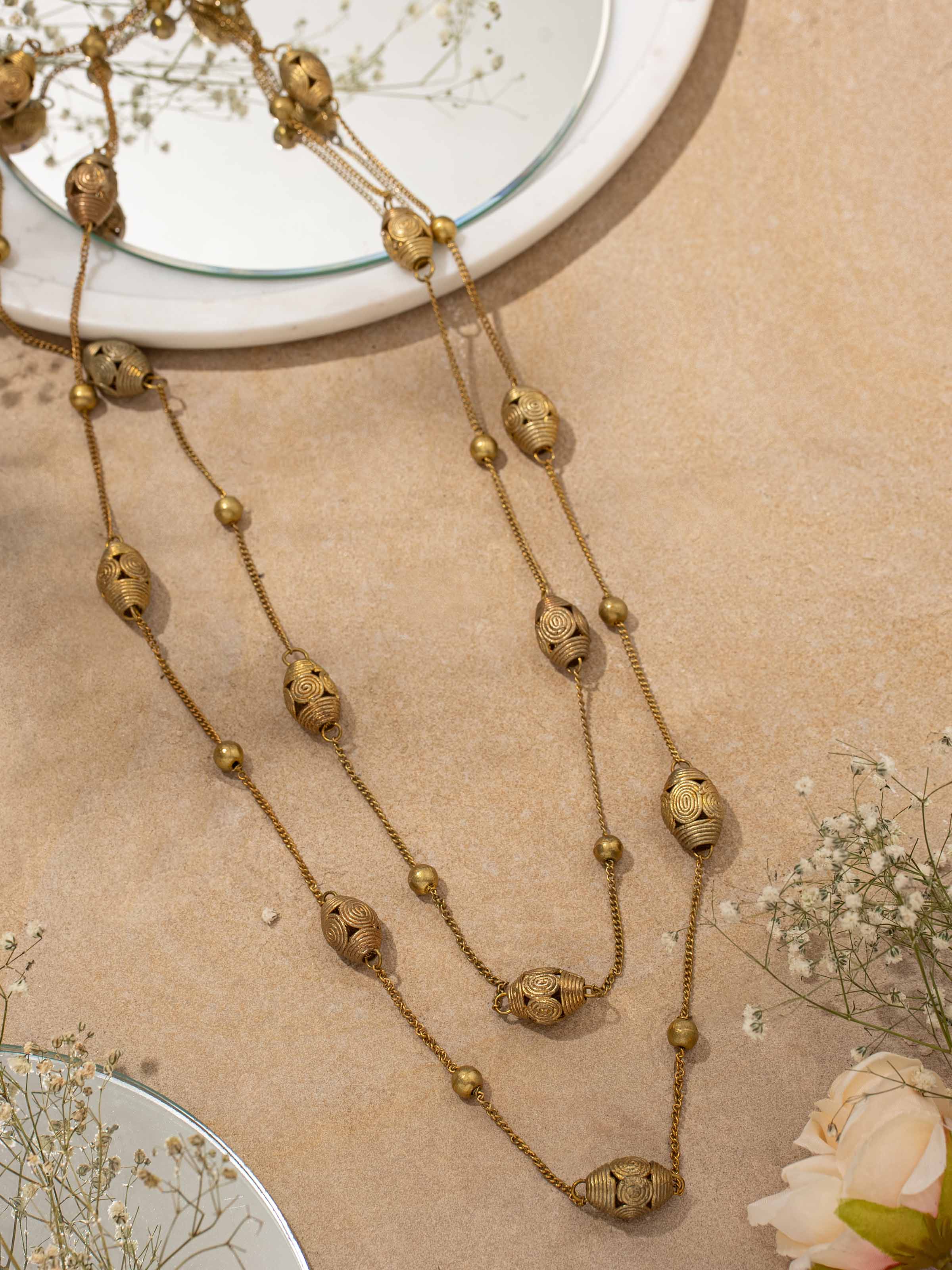 Side view of Nakash Silver Long Necklace highlighting its elegant design.