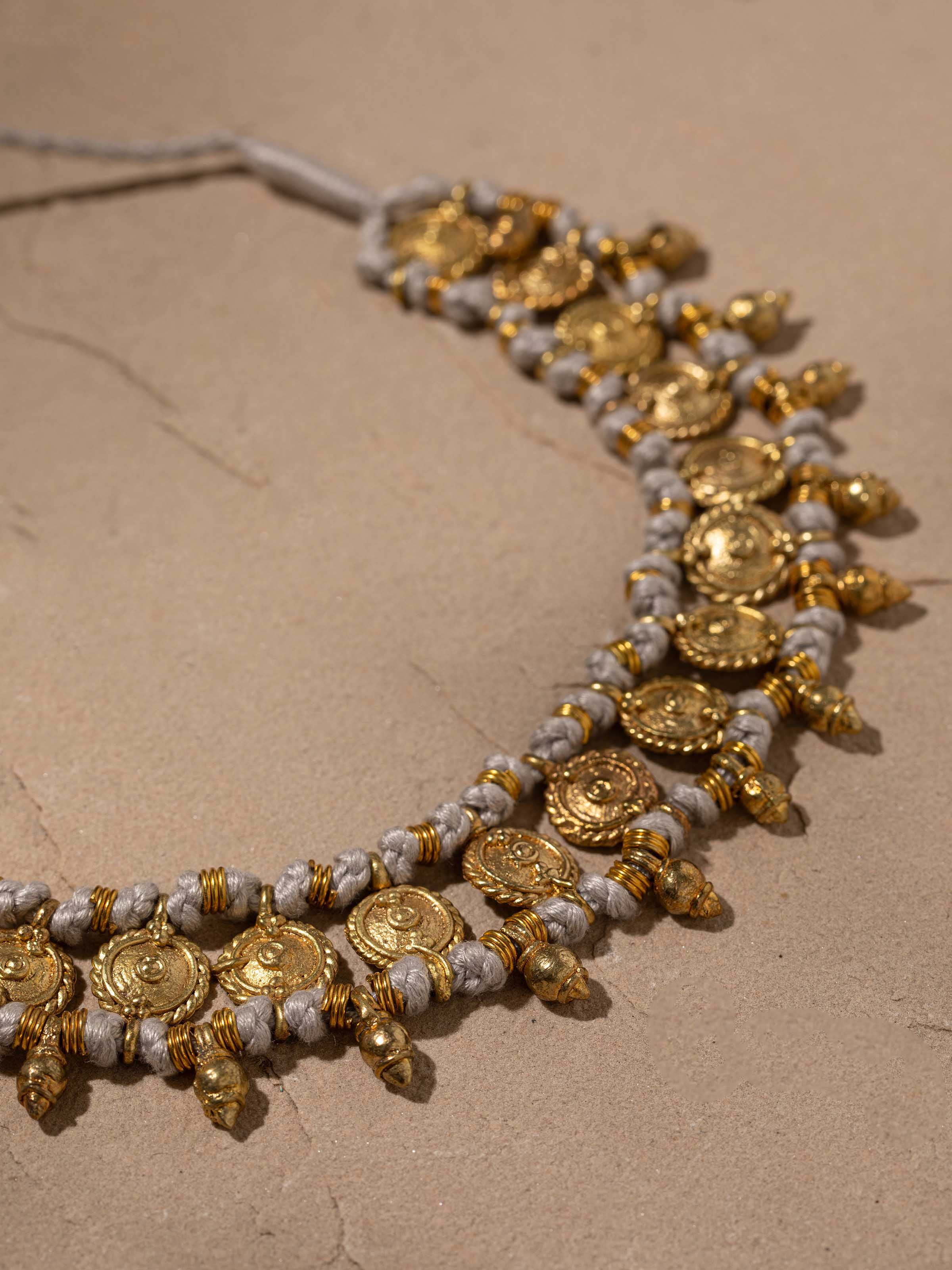 Detailed view of Dhokra Choker focusing on the intricate metal designs and artisanal craftsmanship.