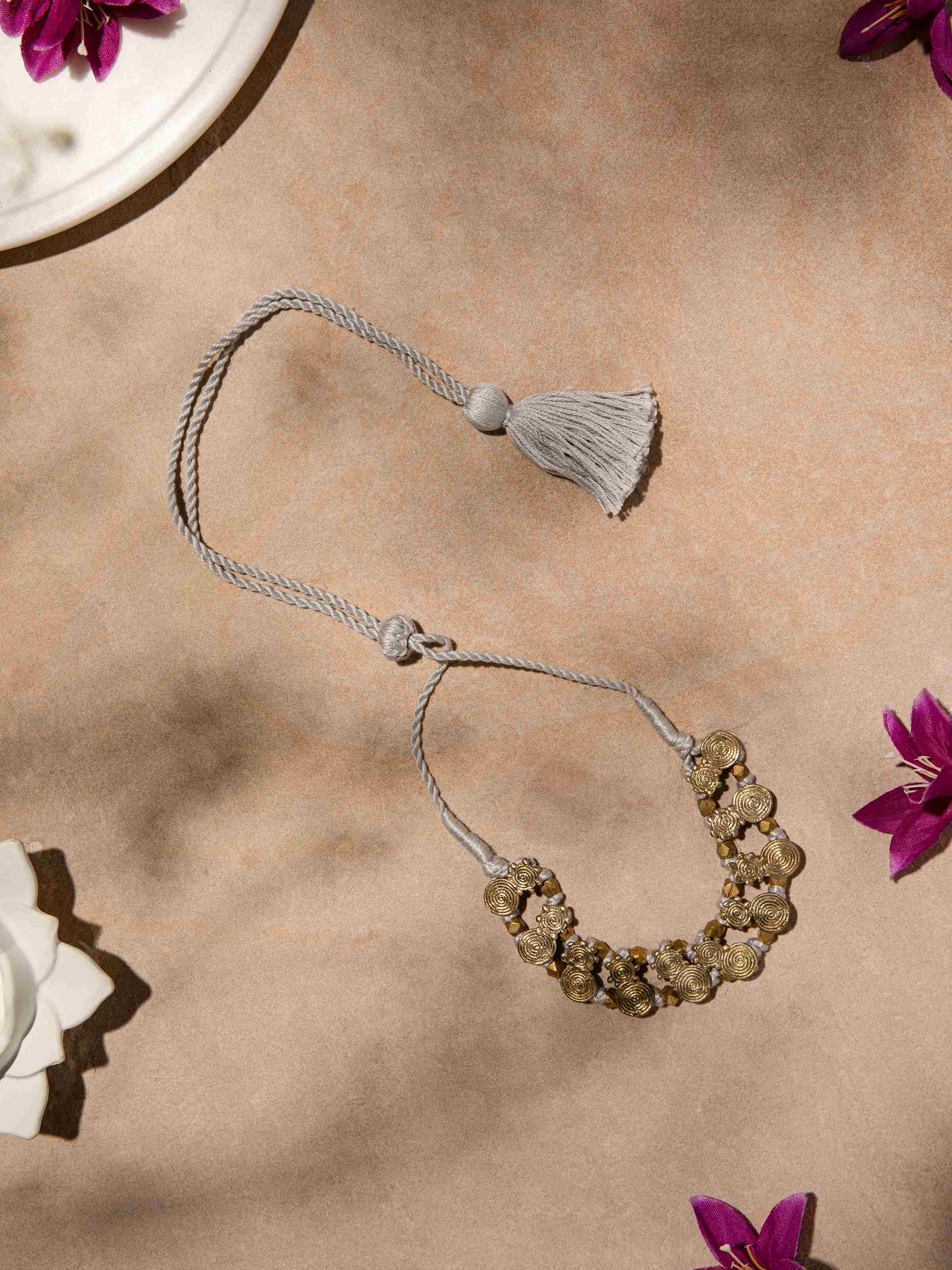 Side view of Dhokra Choker highlighting its detailed craftsmanship and classic design.