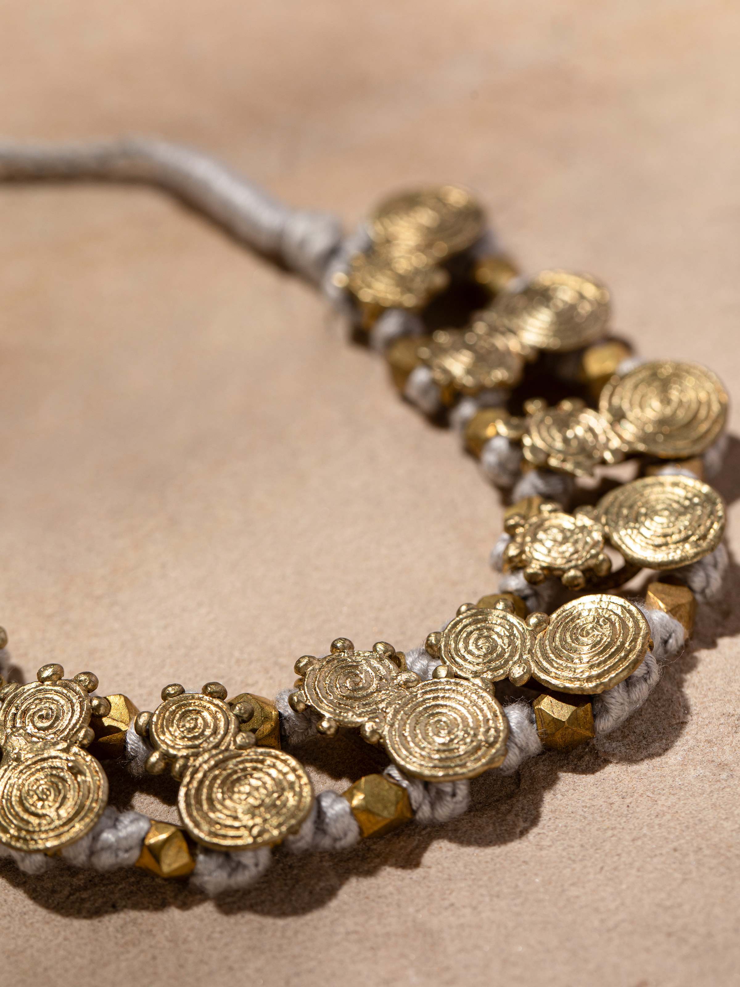 Detailed view of Dhokra Choker highlighting its traditional design and artisanal craftsmanship.