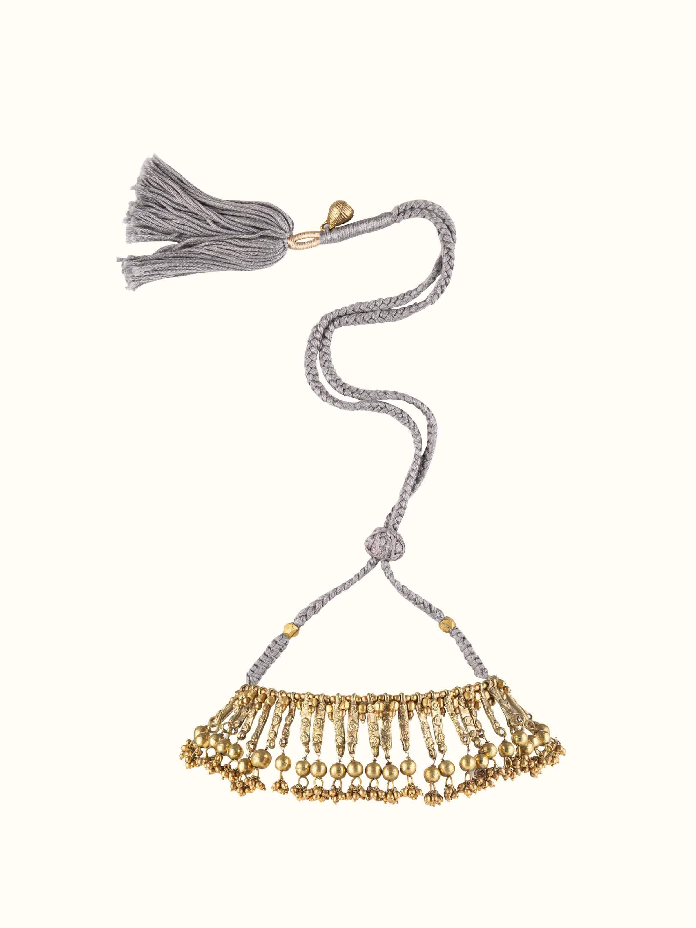 Front view of Dhokra choker displaying traditional tribal design and intricate metalwork.