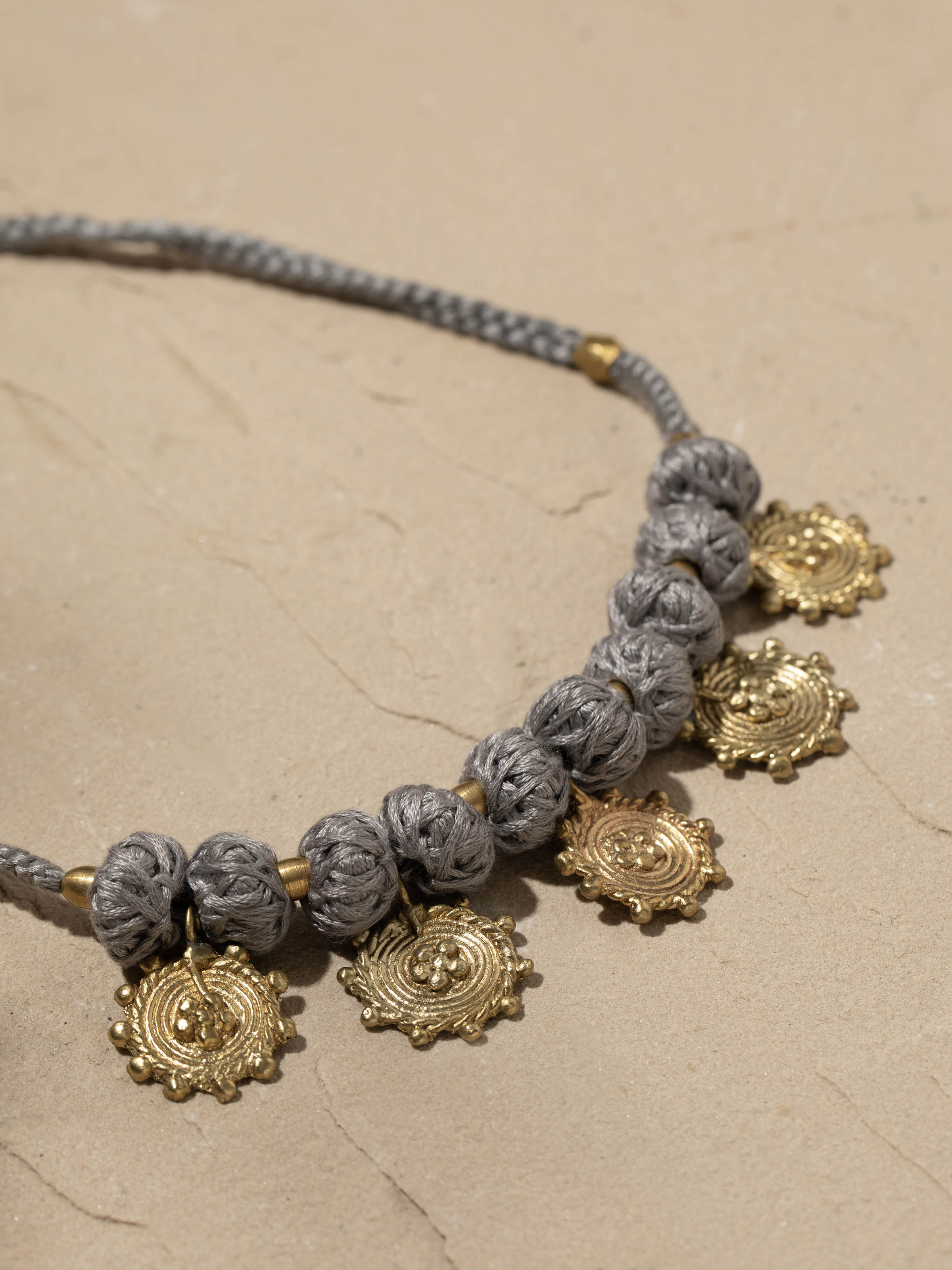Detailed view of Dhokra Choker from a distance emphasizing its craftsmanship.