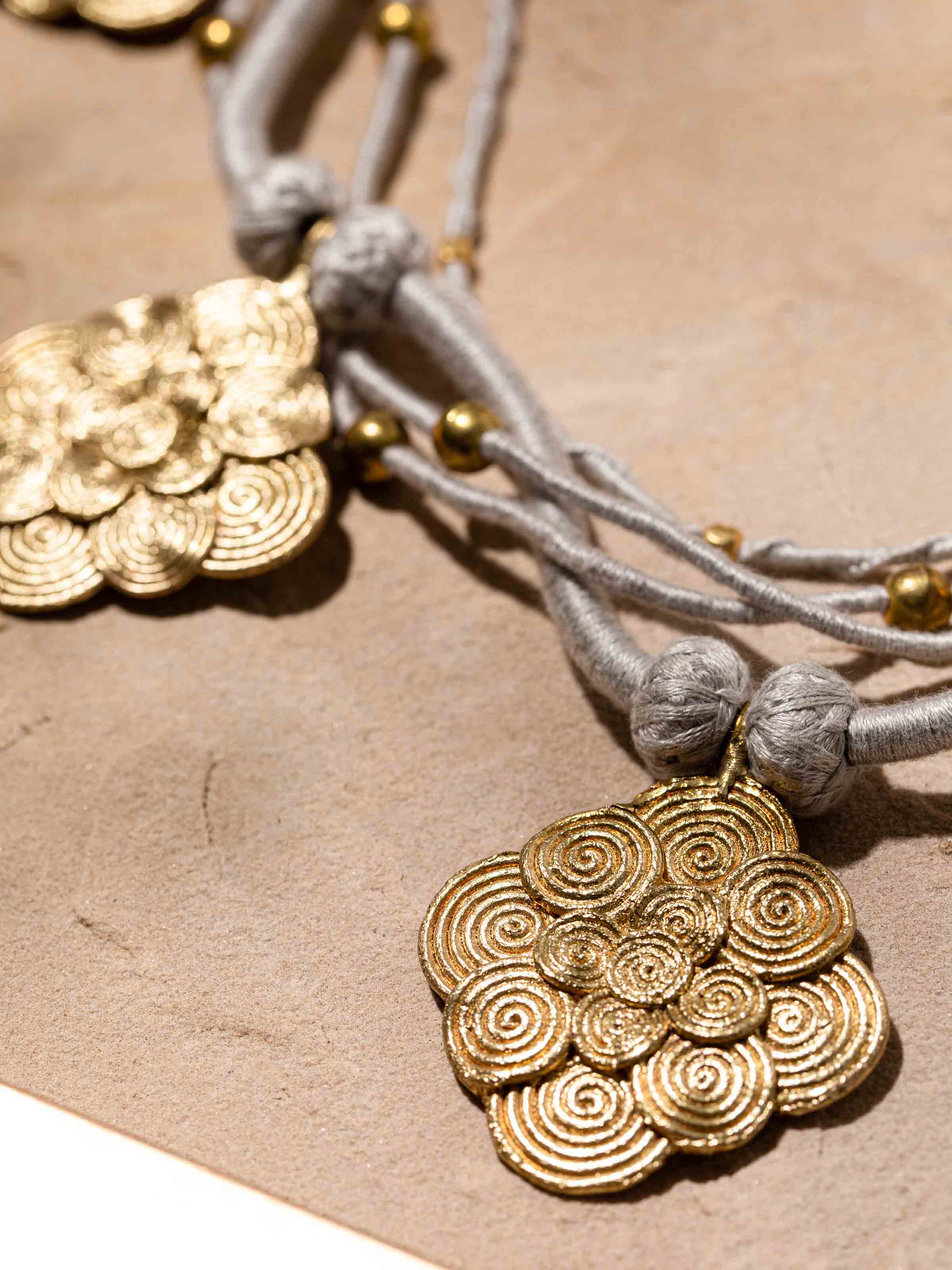 Back view of Dhokra Long Necklace displaying the clasp and overall design.