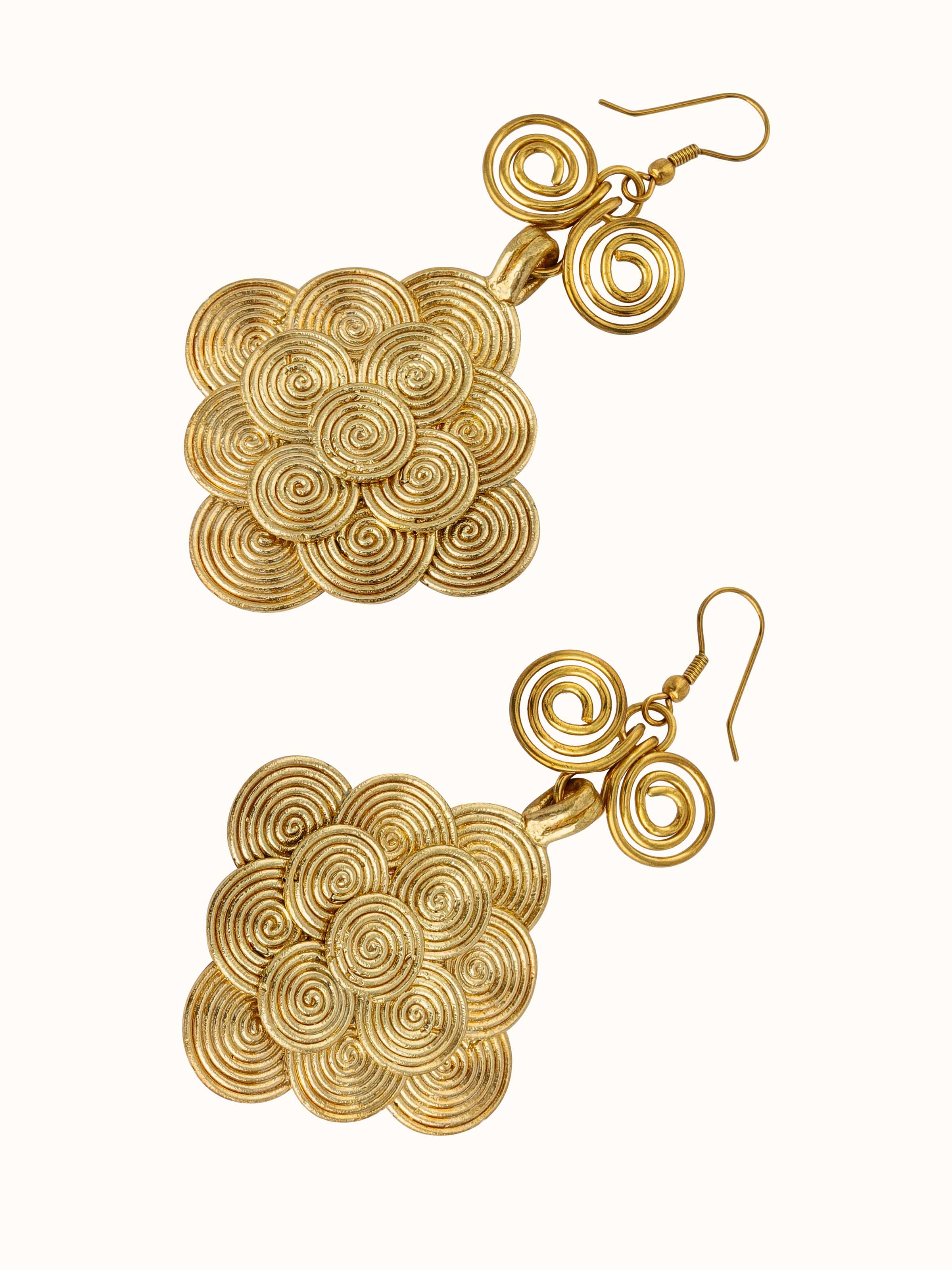 Angled view of Dhokra Drop Earrings highlighting their elegant design and artisanal quality.