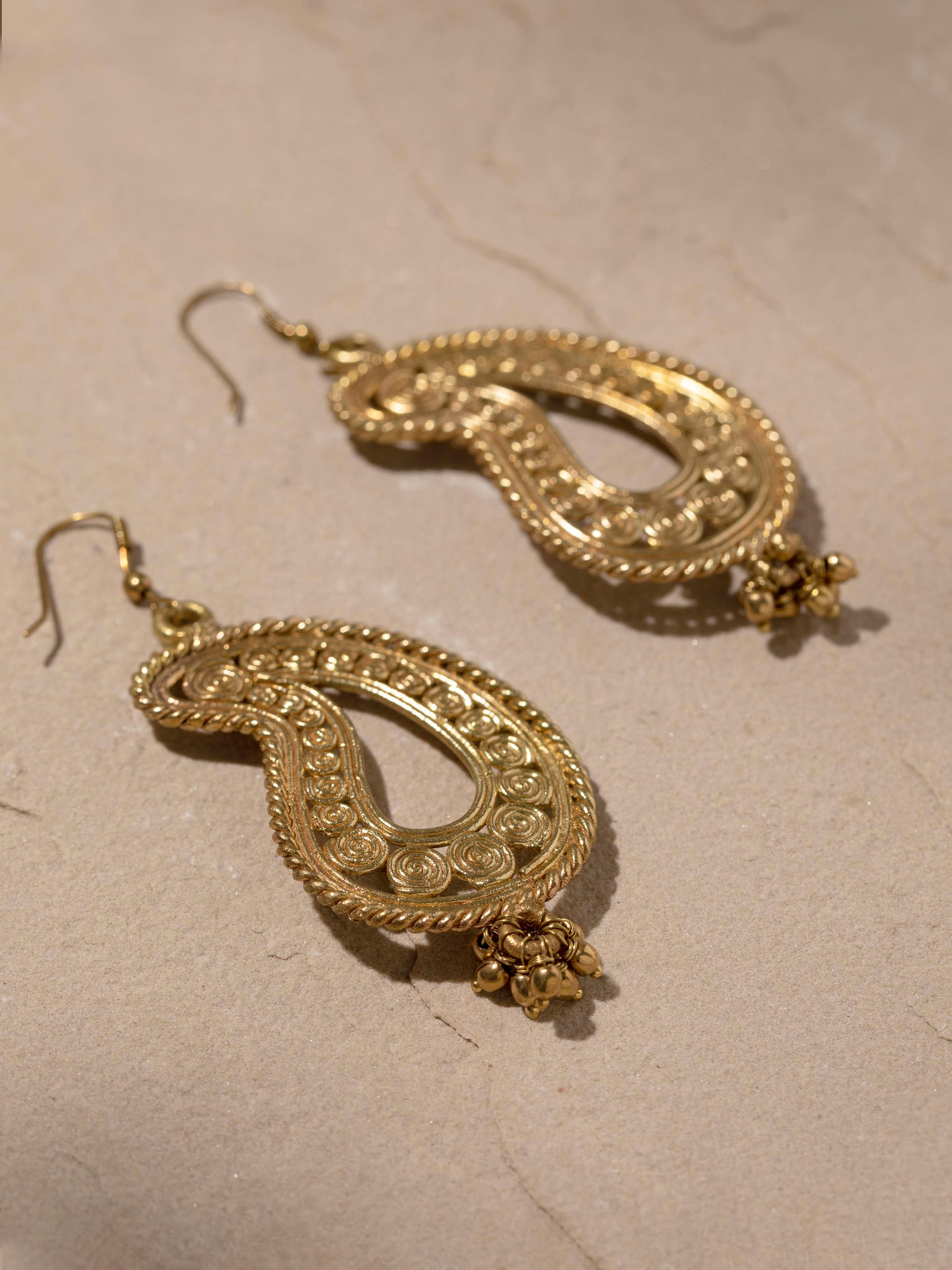 Detailed image of Dhokra Drop Earrings focusing on the intricate Dhokra design and craftsmanship.