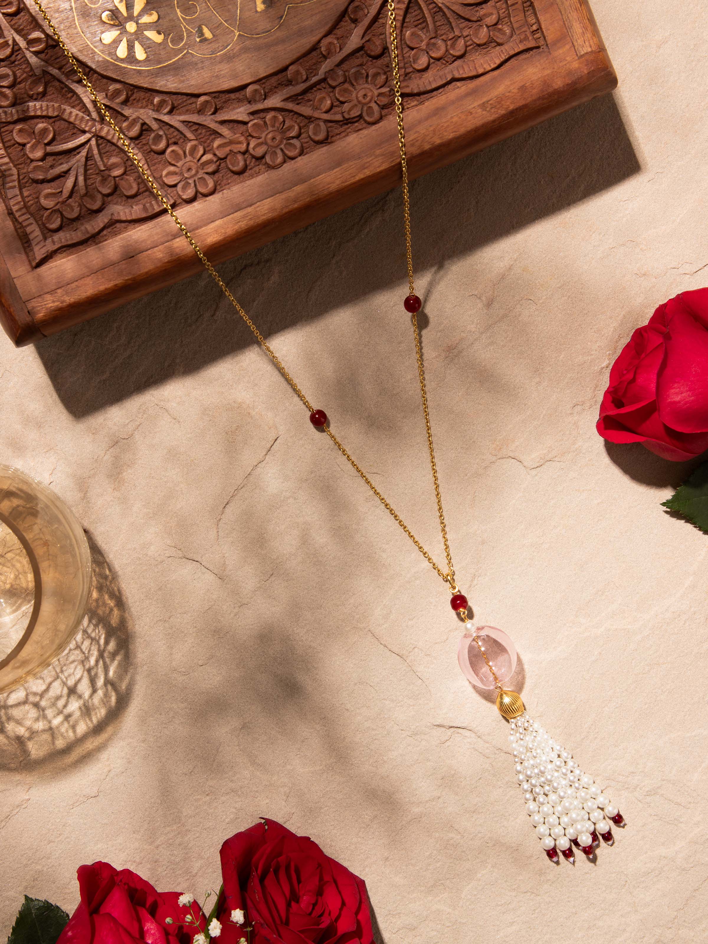 Angled view of Silver Flame Glass Long Necklace showcasing the intricate glass beads and silver accents by Swadesh