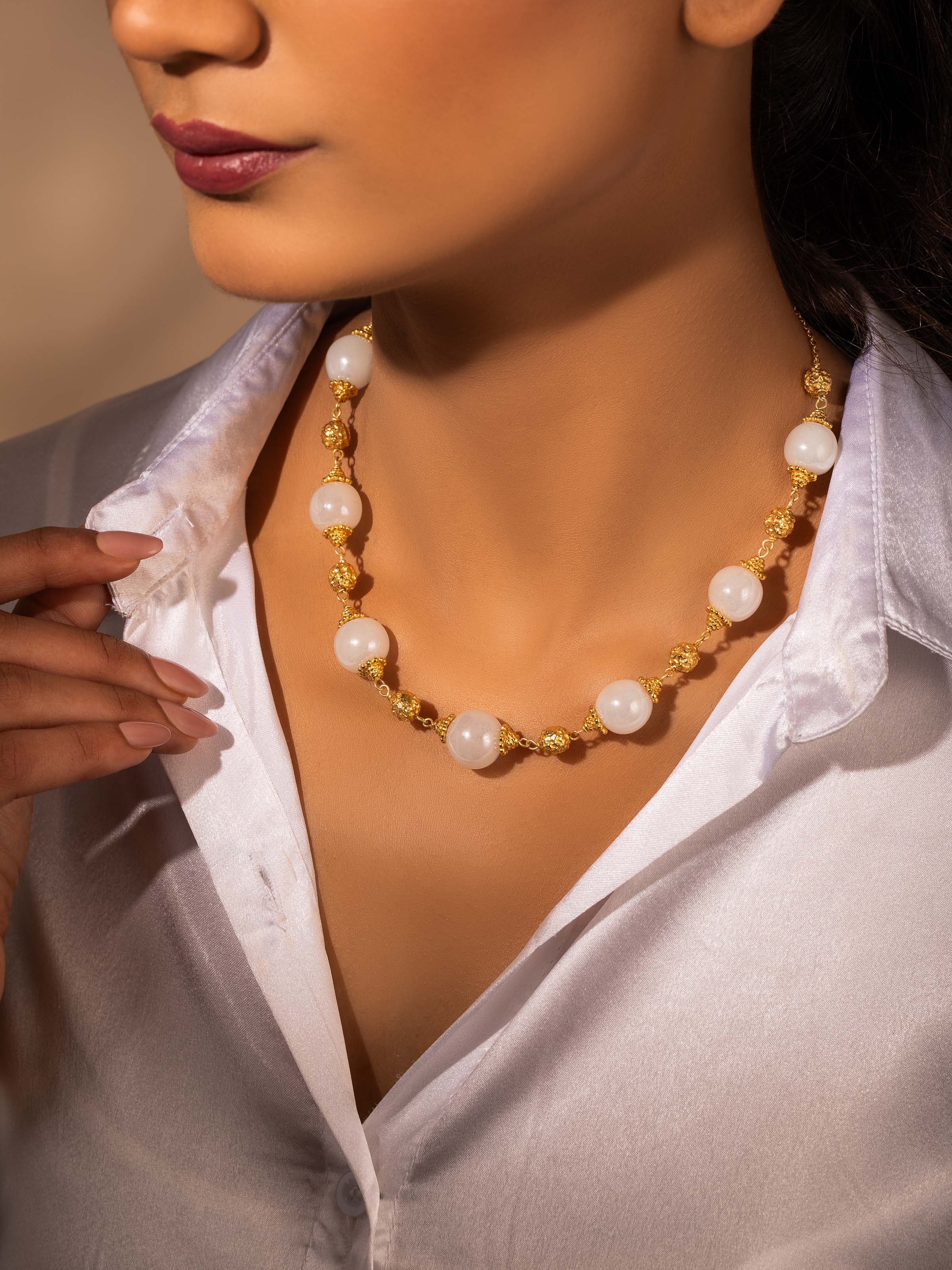 Side view of Silver Smithing Drop Earrings showcasing their fine detailing.