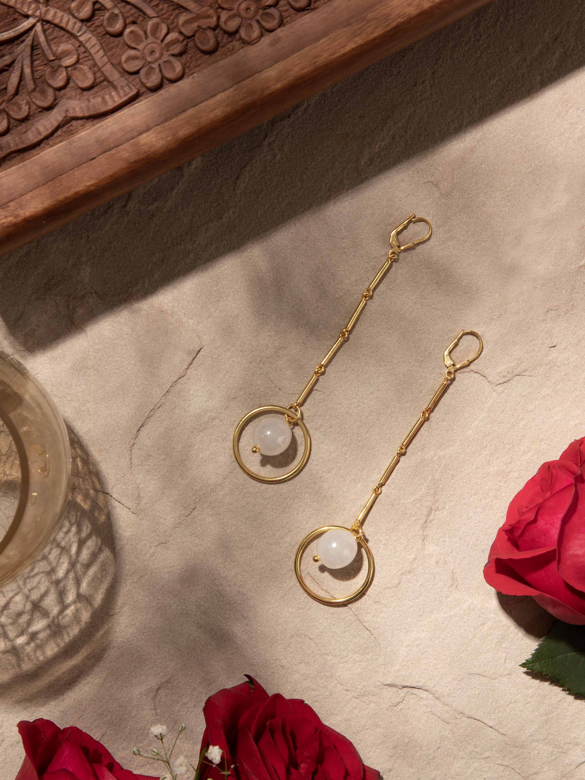 Close-up view of Silver Flame Glass Drop Earrings highlighting detailed glass and silverwork.