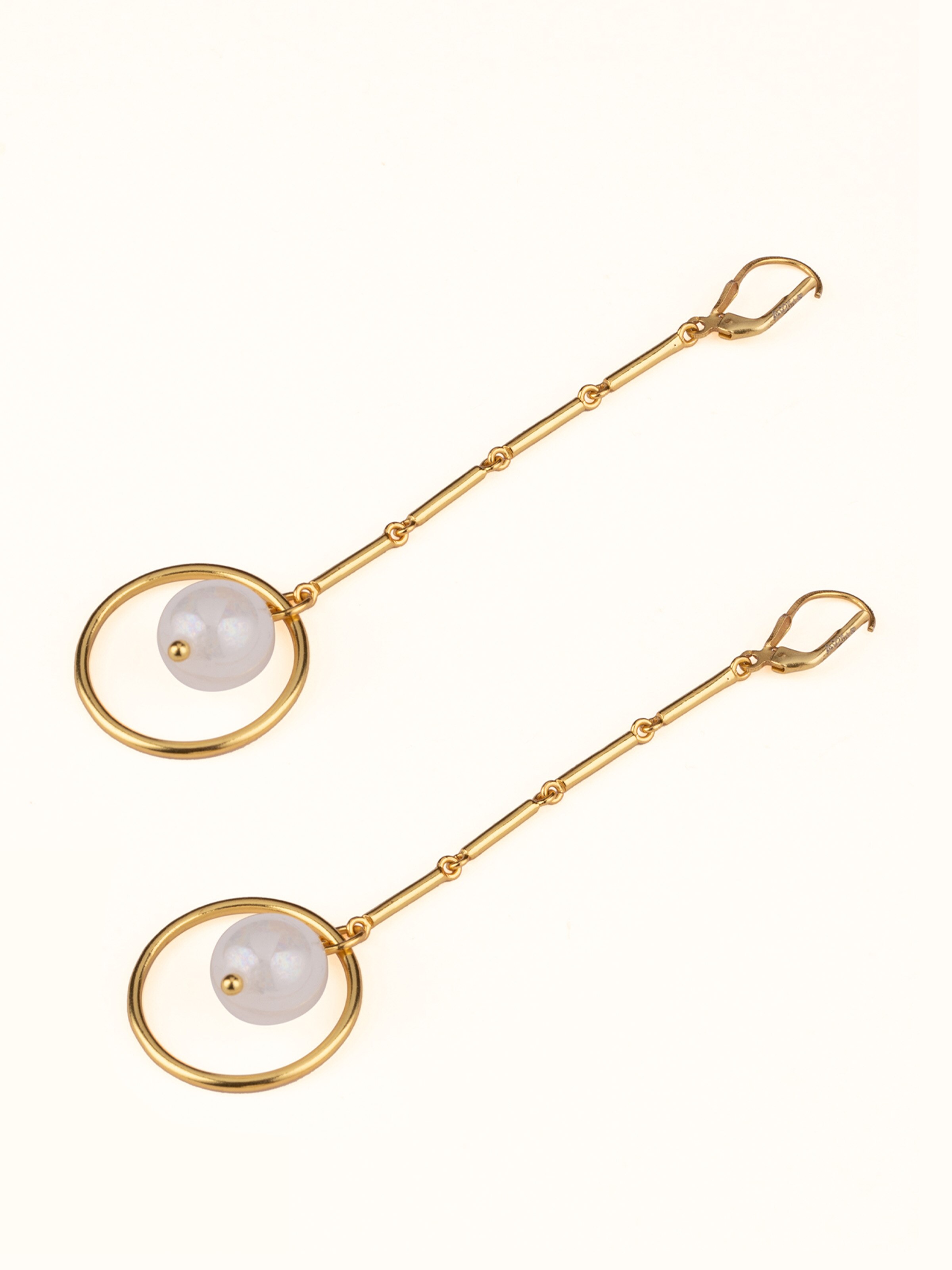 Angled view of Silver Flame Glass Drop Earrings showcasing elegant glasswork and silver details.