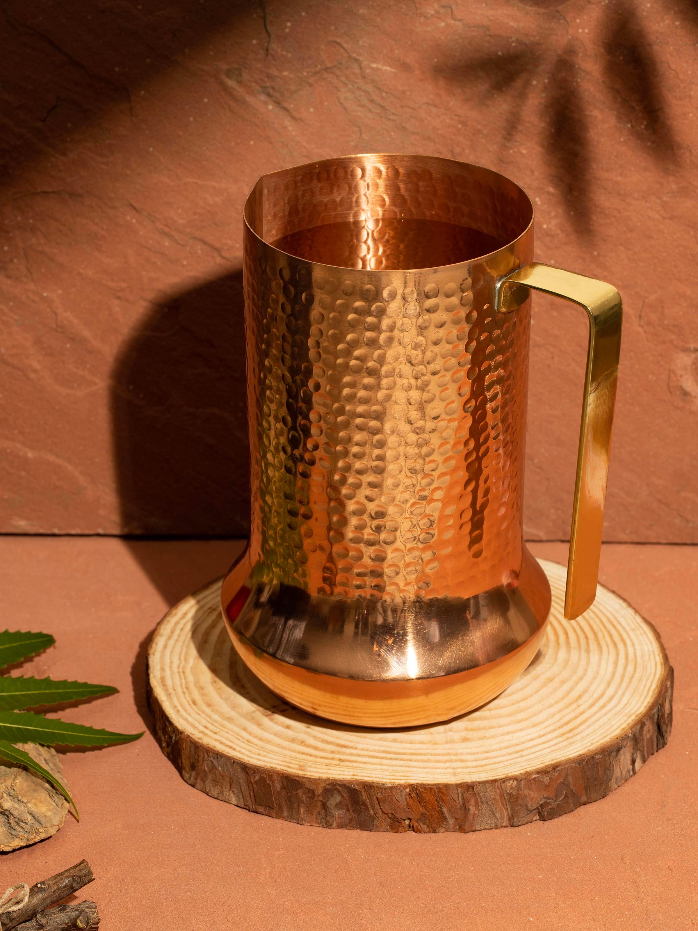 Close-up view of Copper Metal Jug focusing on the handle and detailed surface texture.