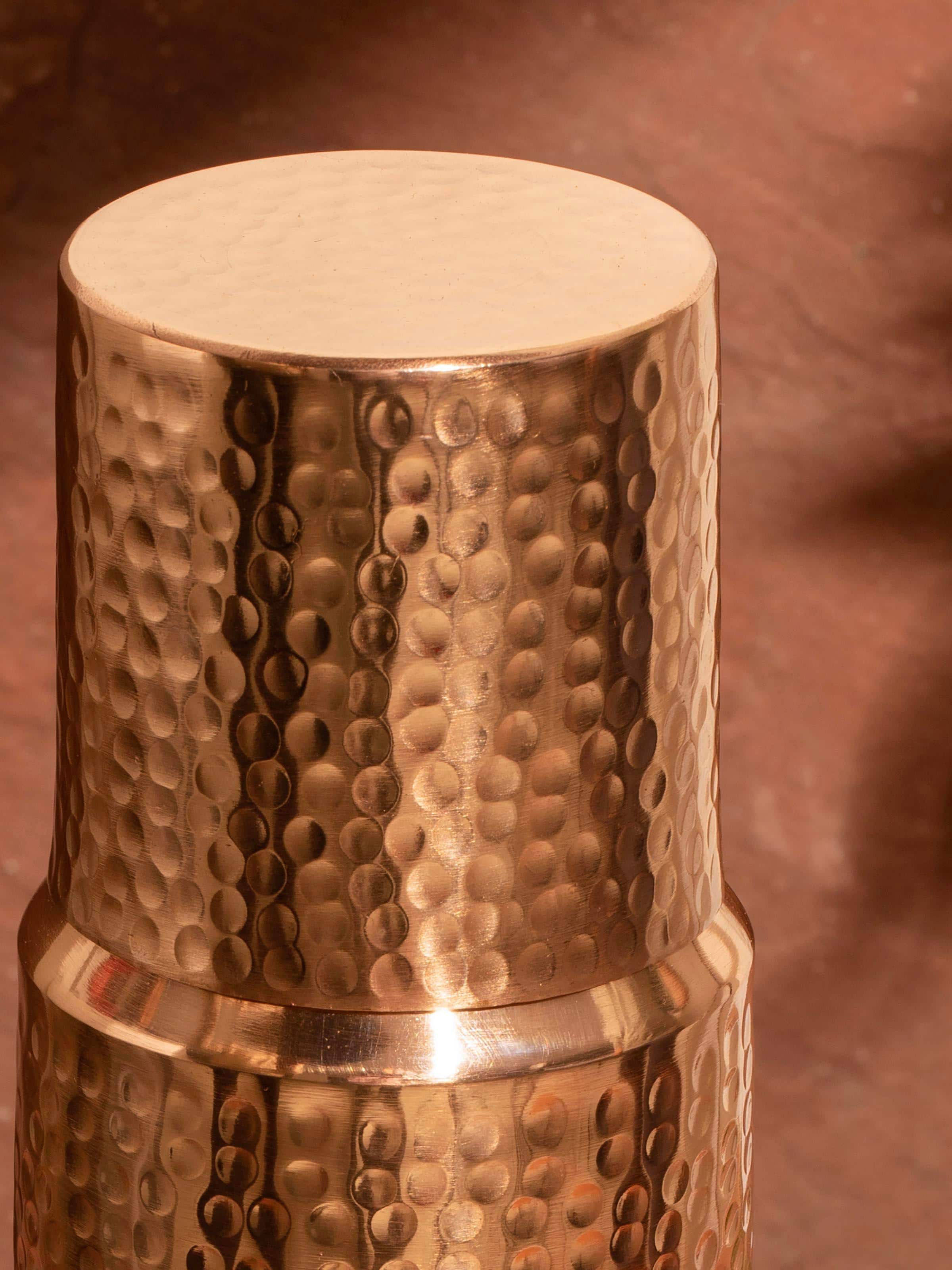 Close-up of Copper Metal Carafe with a Lid emphasizing the craftsmanship and natural copper texture