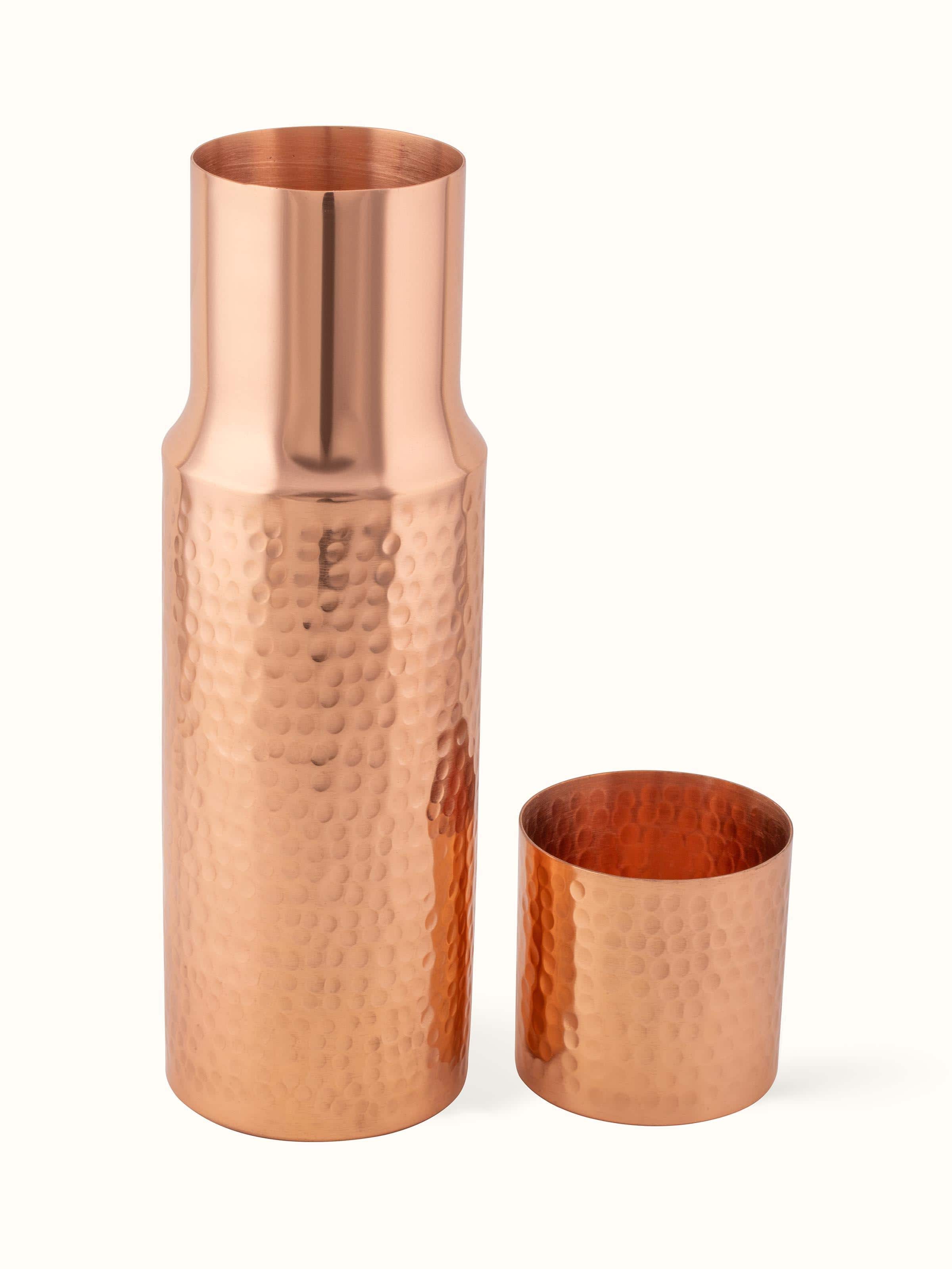 Back view of Copper Metal Carafe with a Lid showcasing product details and care instructions