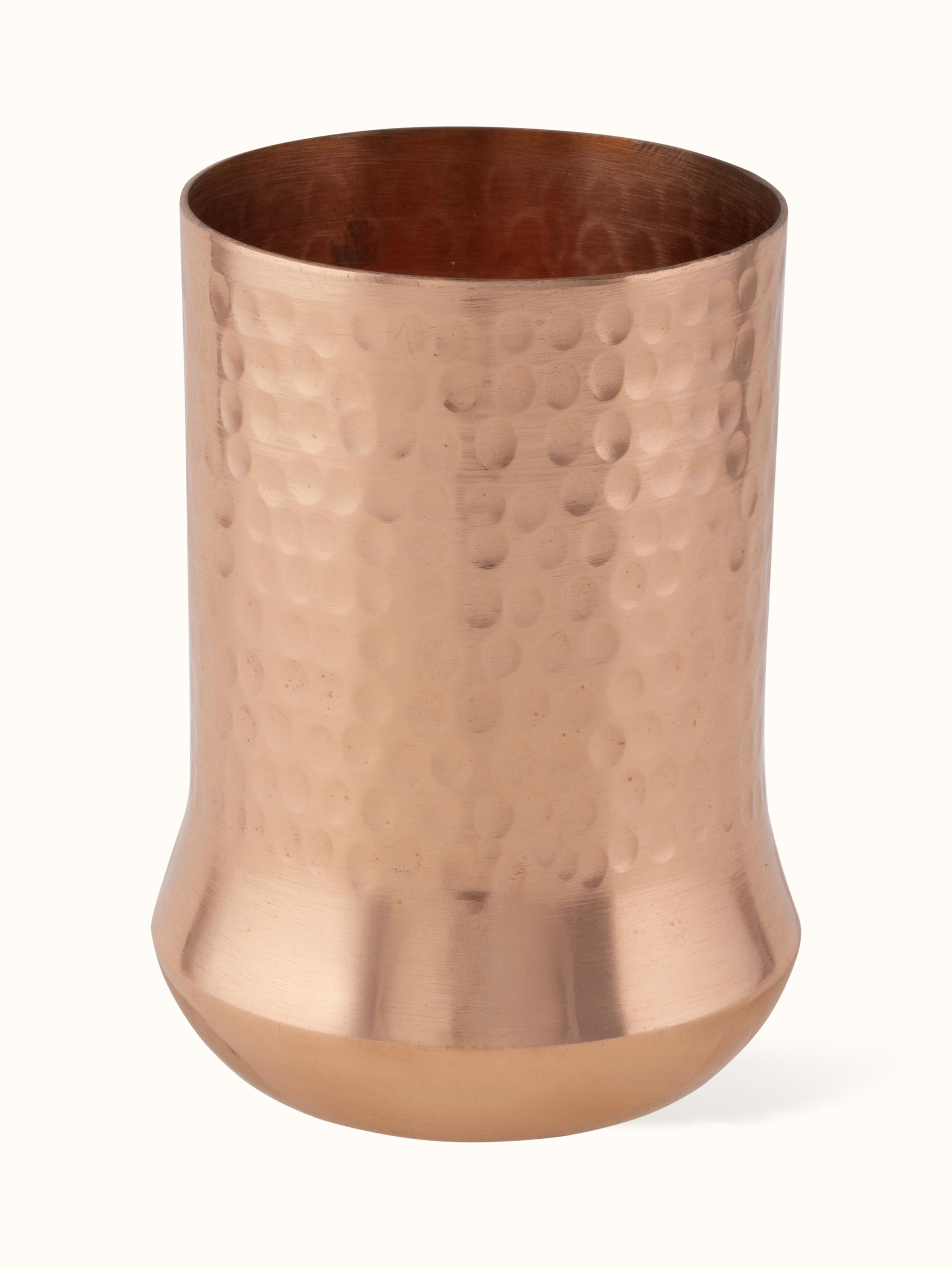 Front view of elegant copper metal glass with a polished finish and sleek design.