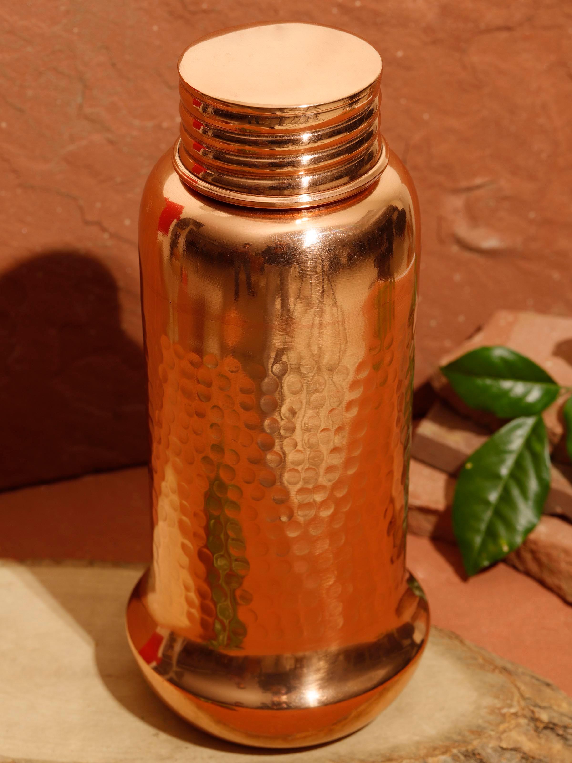 Close-up view of Copper Metal Hammered Bottle emphasizing the texture and craftsmanship of the metal.