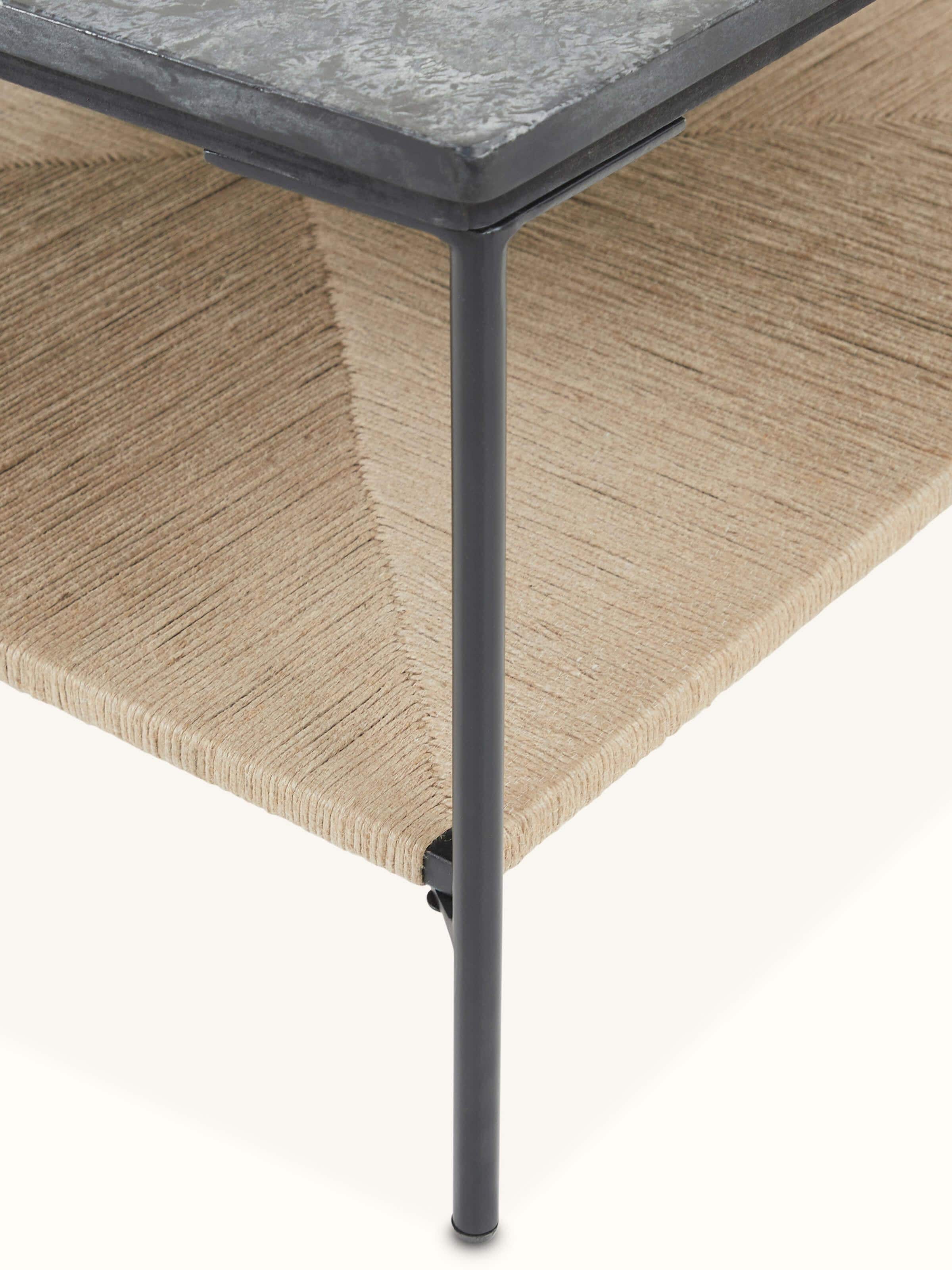 Artistic view of Jute & Marble coffee table highlighting the combination of sleek marble and textured jute in a stylish design.