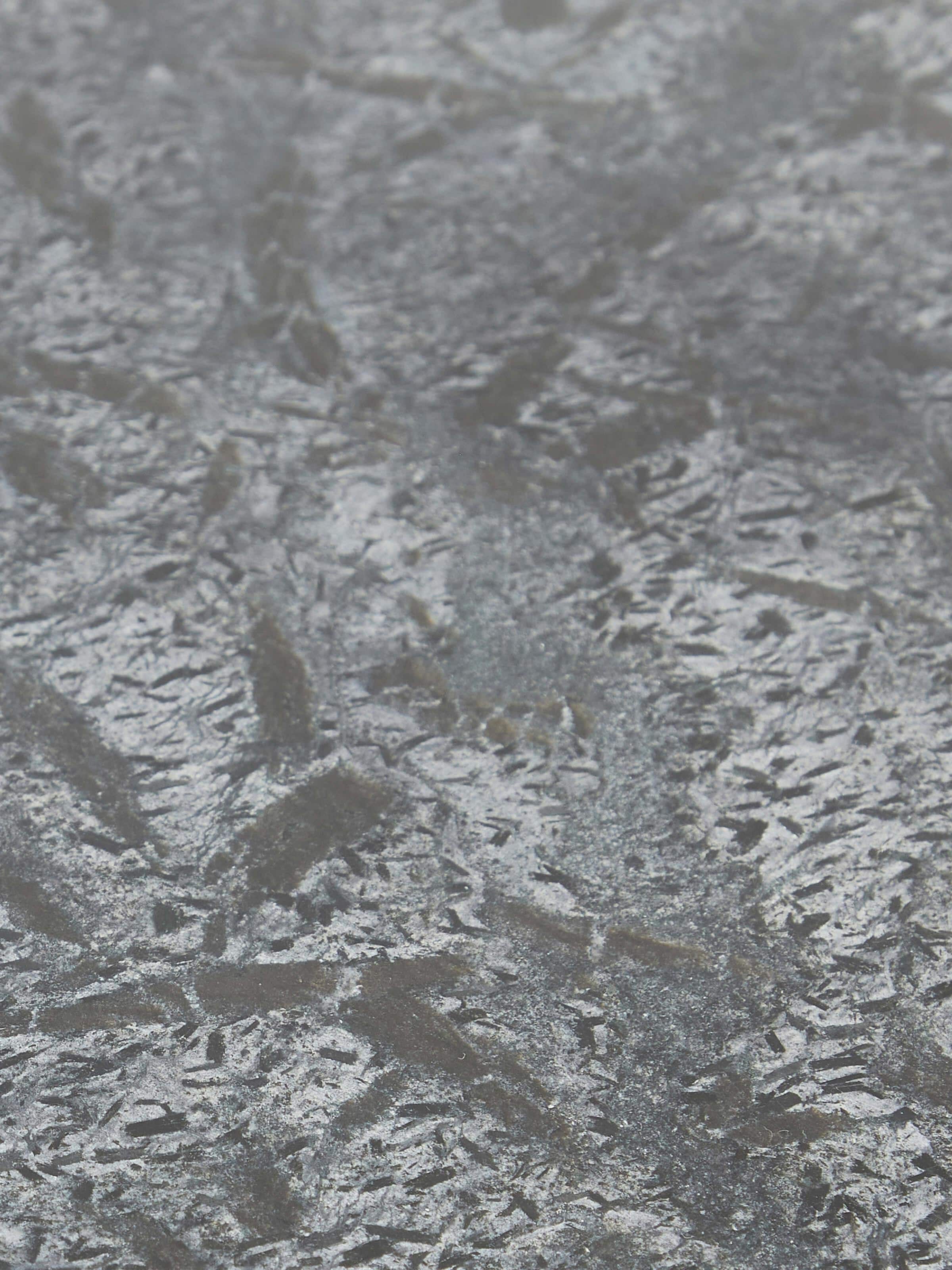 Side-angle view of Jute & Marble coffee table showing the smooth finish of marble and the natural texture of the jute base for a sophisticated look.