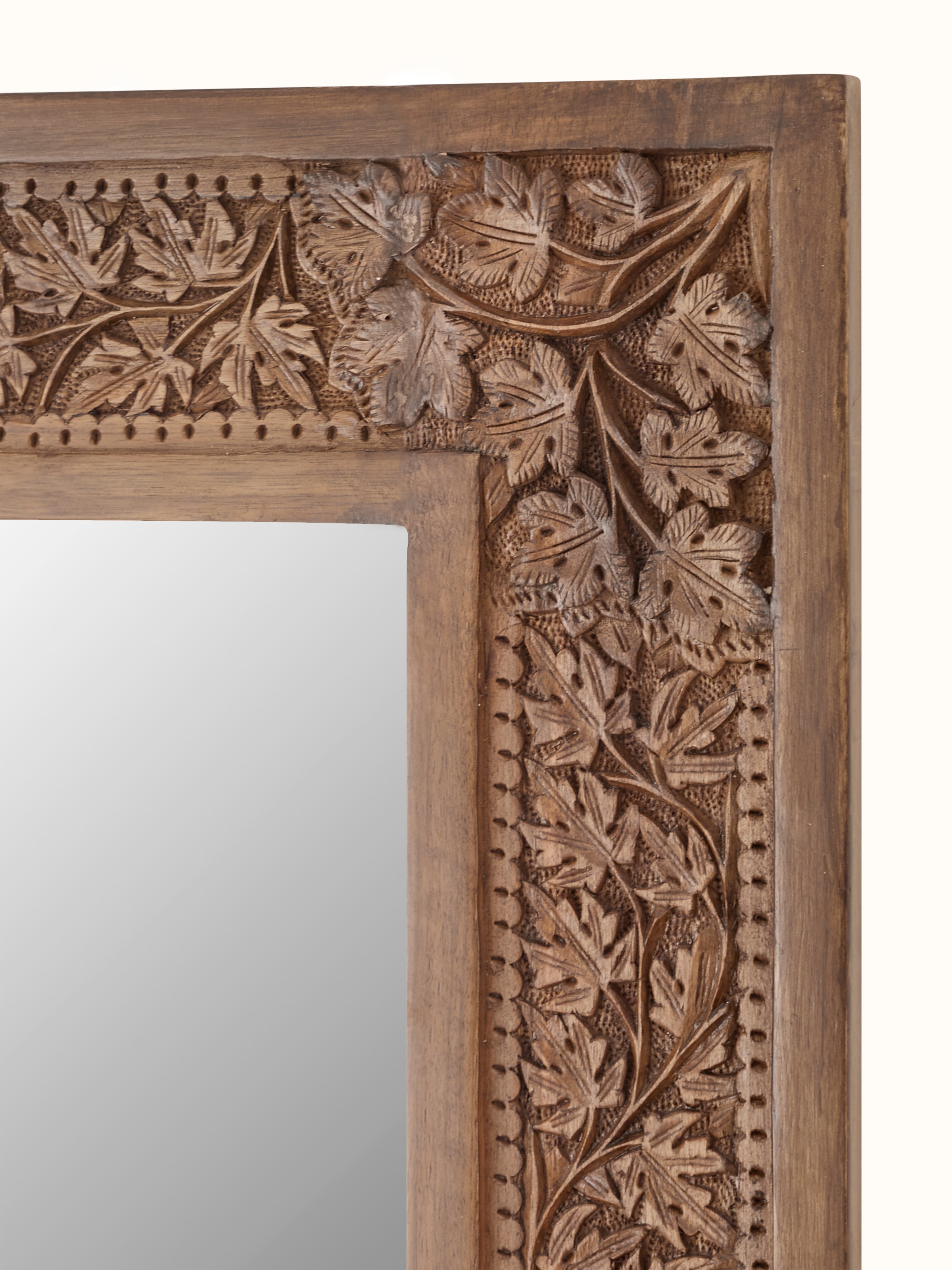Angled view of the walnut wood full-length mirror, emphasizing its elegant design and sturdy construction.