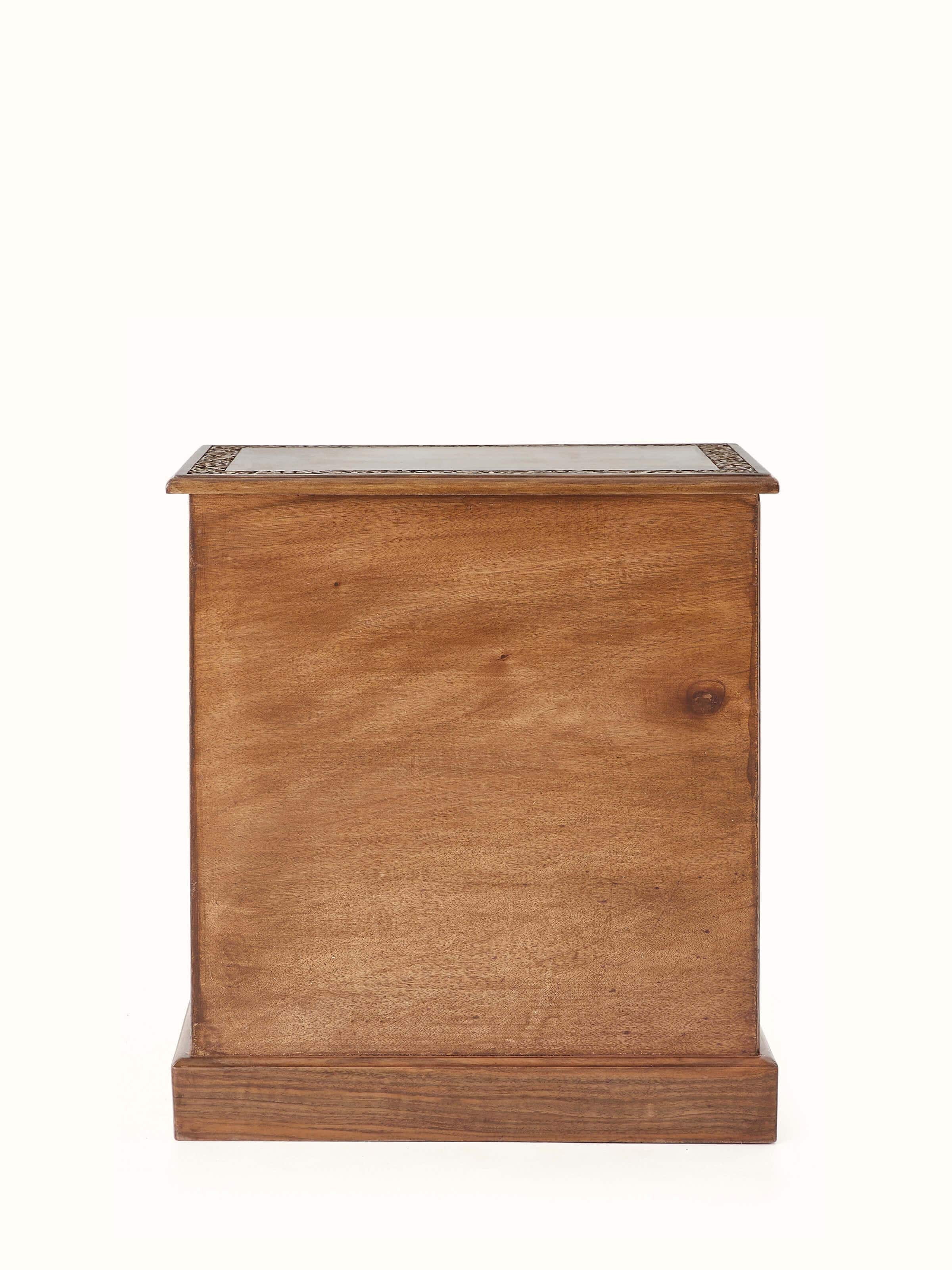 Front and side view of the carved walnut wood bedside table, highlighting the elegant design and functional features