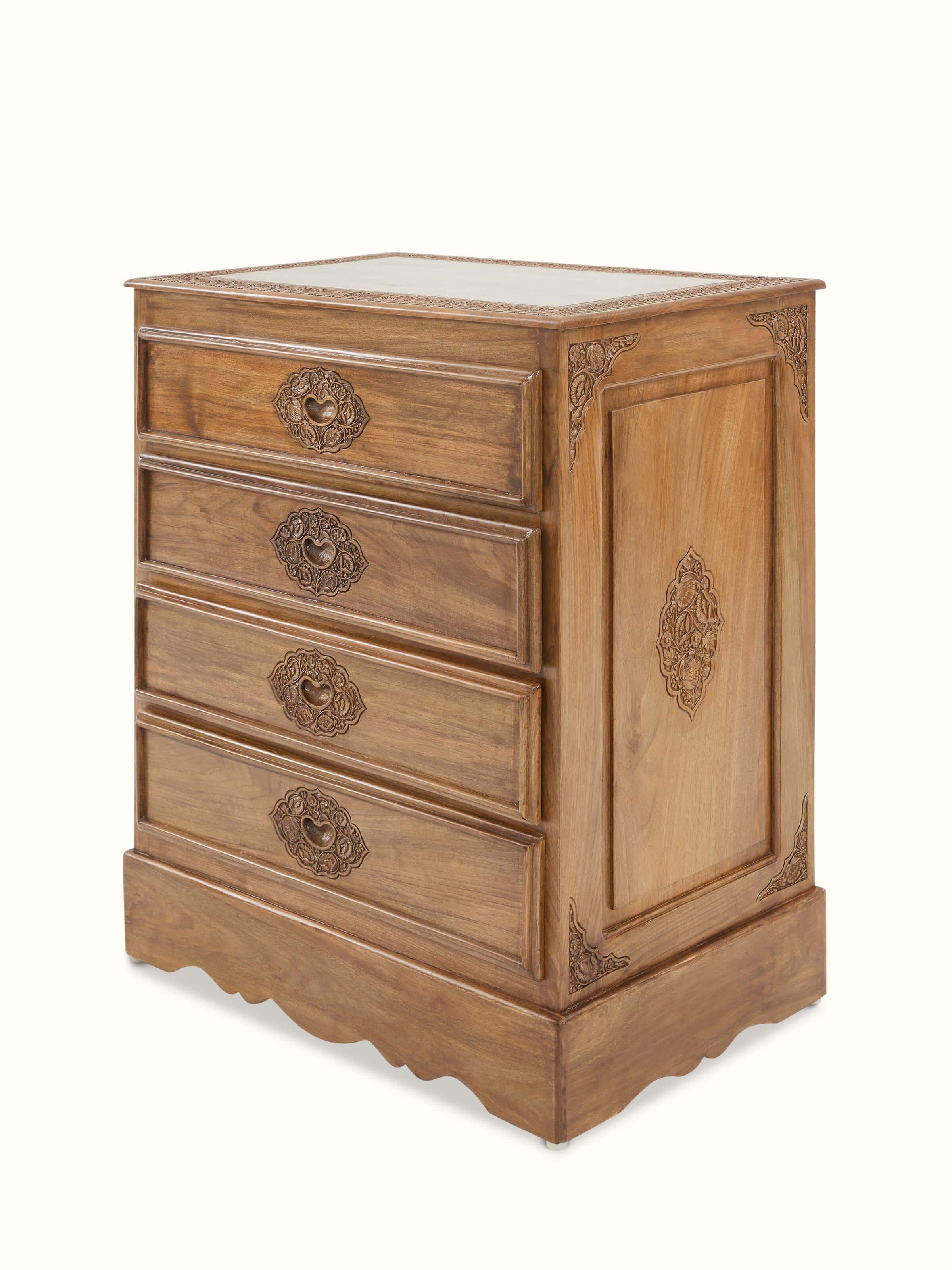 Close-up of the carving details on Carved Walnut Wood Drawer Chest, focusing on craftsmanship