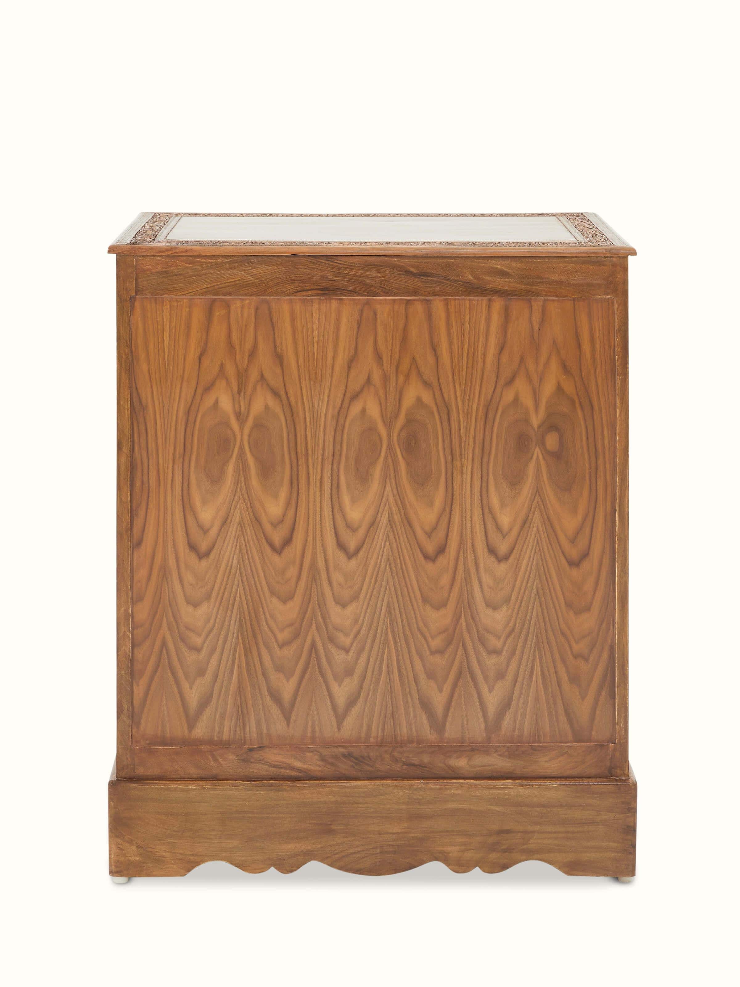 View of Carved Walnut Wood Drawer Chest in a room setting, showcasing its functionality