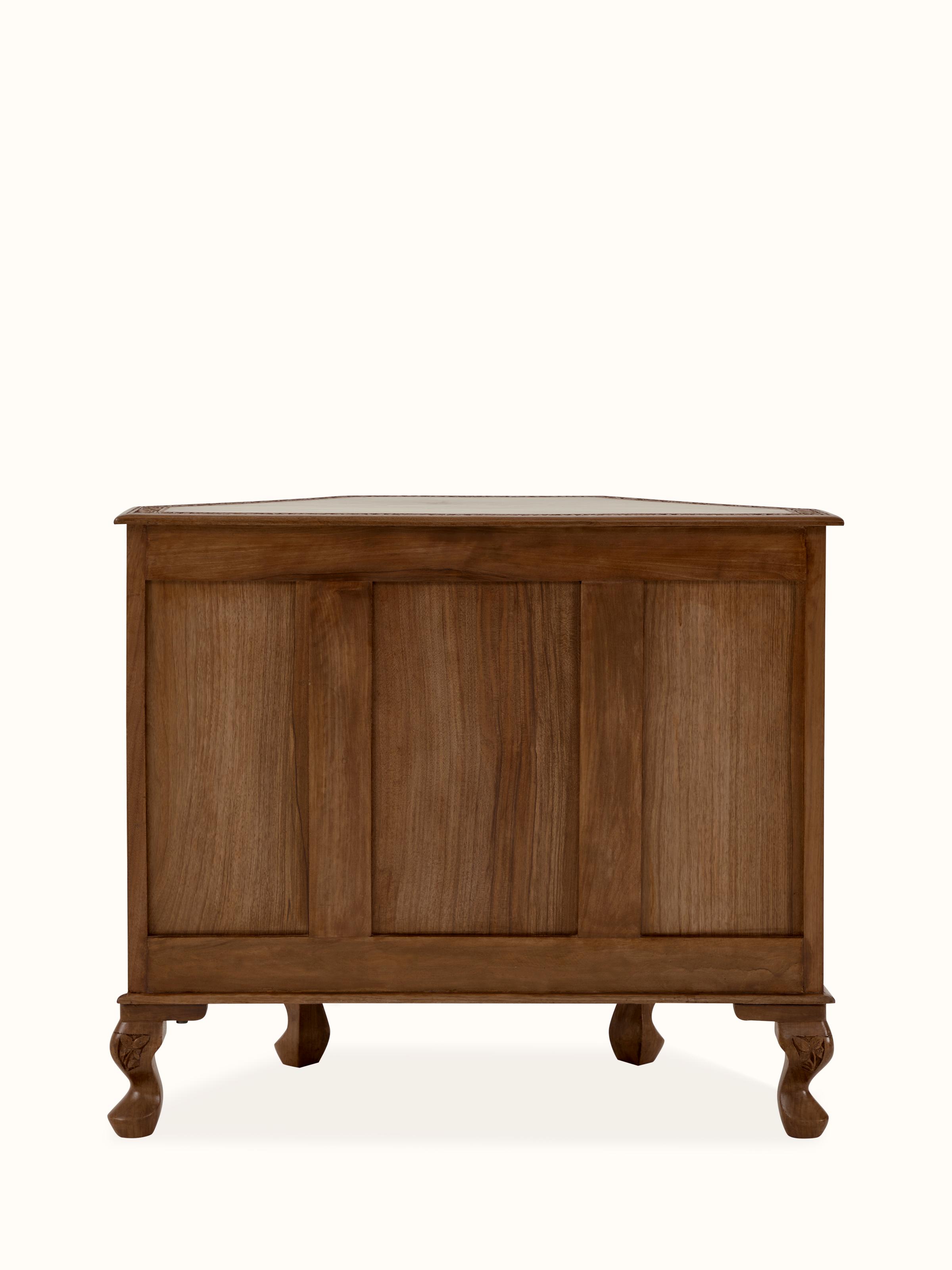 Close-up of the walnut wood grain and carved details on the sideboard, emphasizing its natural finish